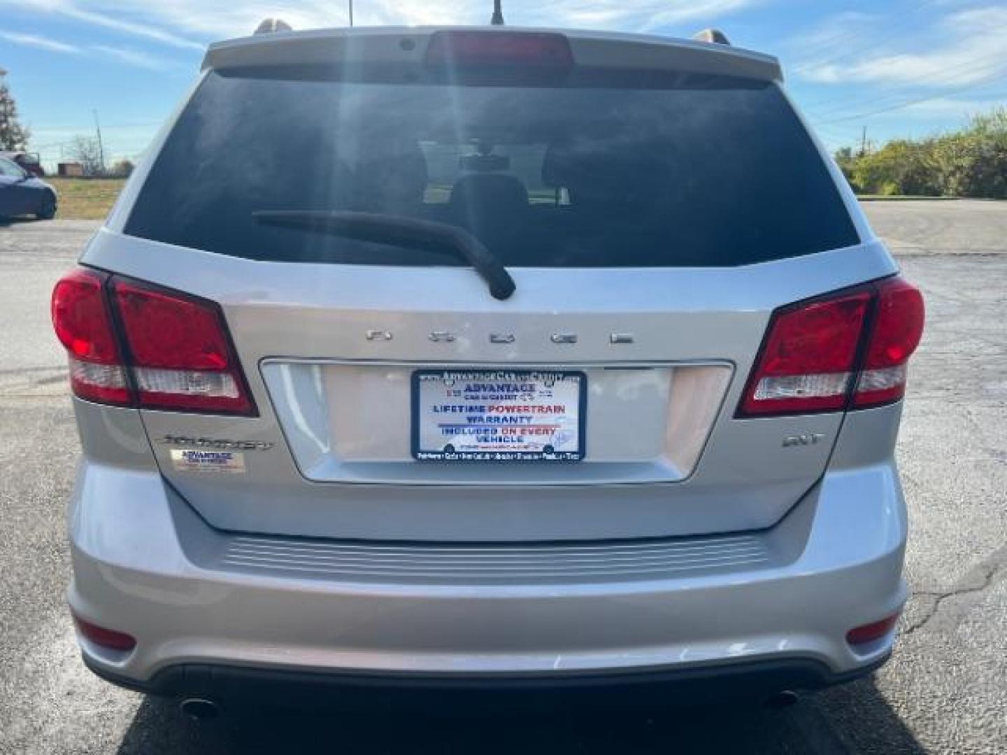 2014 Bright Silver Metallic CC Dodge Journey SXT (3C4PDCBG5ET) with an 3.6L V6 DOHC 24V engine, 6-Speed Automatic transmission, located at 401 Woodman Dr, Riverside, OH, 45431, (937) 908-9800, 39.763779, -84.122063 - Photo#4