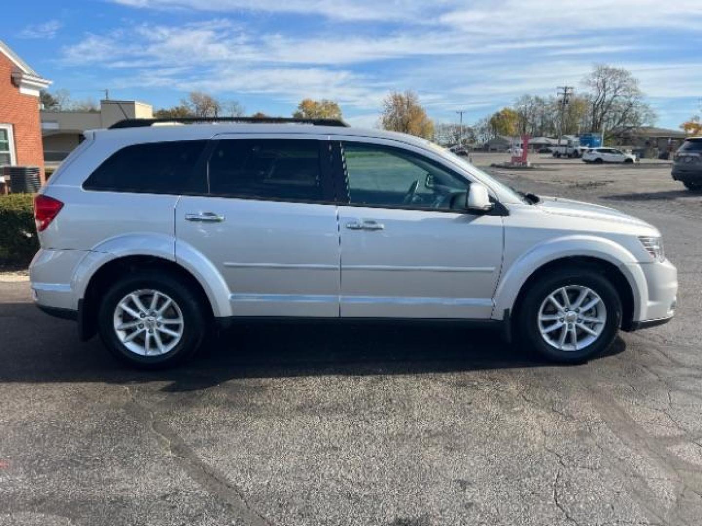 2014 Bright Silver Metallic CC Dodge Journey SXT (3C4PDCBG5ET) with an 3.6L V6 DOHC 24V engine, 6-Speed Automatic transmission, located at 401 Woodman Dr, Riverside, OH, 45431, (937) 908-9800, 39.763779, -84.122063 - Photo#5