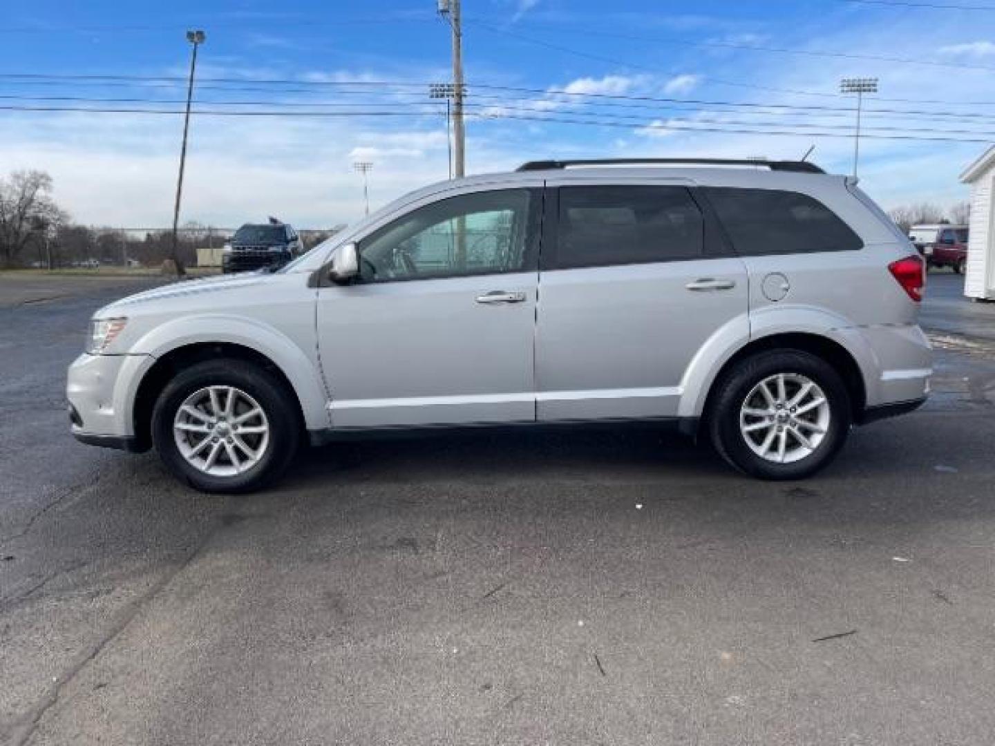 2014 Bright Silver Metallic CC Dodge Journey SXT (3C4PDCBG0ET) with an 3.6L V6 DOHC 24V engine, 6-Speed Automatic transmission, located at 401 Woodman Dr, Riverside, OH, 45431, (937) 908-9800, 39.763779, -84.122063 - Photo#2