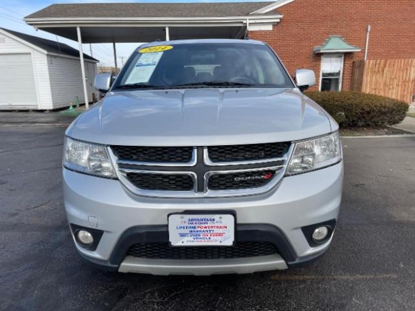 2014 Bright Silver Metallic CC Dodge Journey SXT (3C4PDCBG0ET) with an 3.6L V6 DOHC 24V engine, 6-Speed Automatic transmission, located at 401 Woodman Dr, Riverside, OH, 45431, (937) 908-9800, 39.763779, -84.122063 - Photo#5