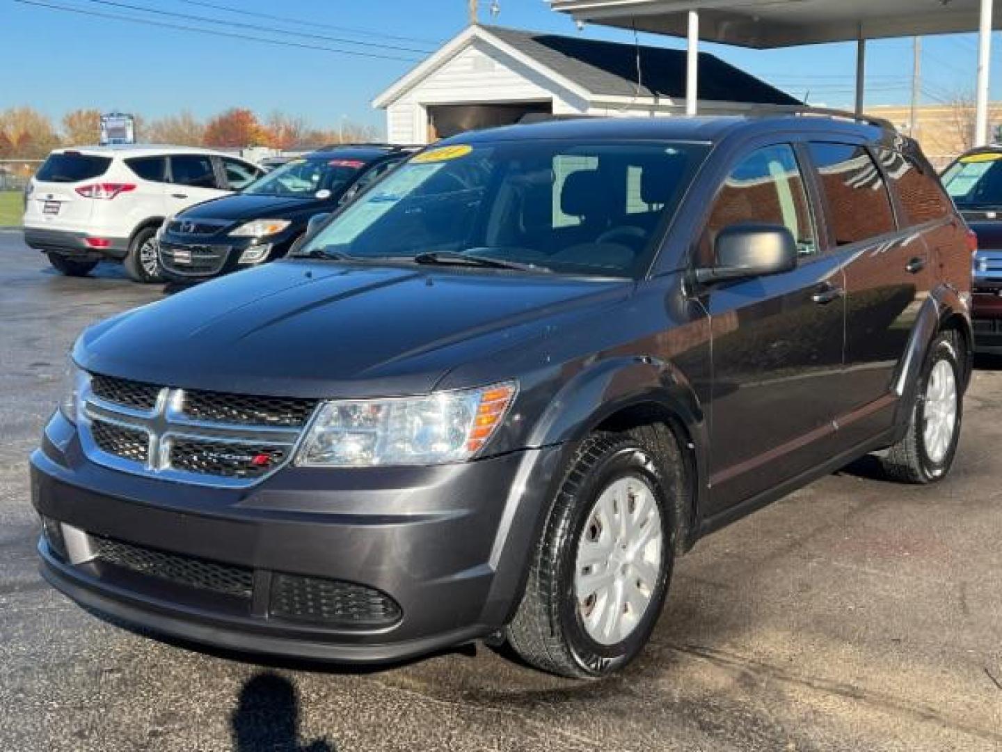 2014 Granite Crystal Met CC Dodge Journey SE (3C4PDCAB7ET) with an 2.4L L4 DOHC 16V engine, 4-Speed Automatic transmission, located at 880 E. National Road, Vandalia, OH, 45377, (937) 908-9800, 39.892189, -84.181015 - Photo#2