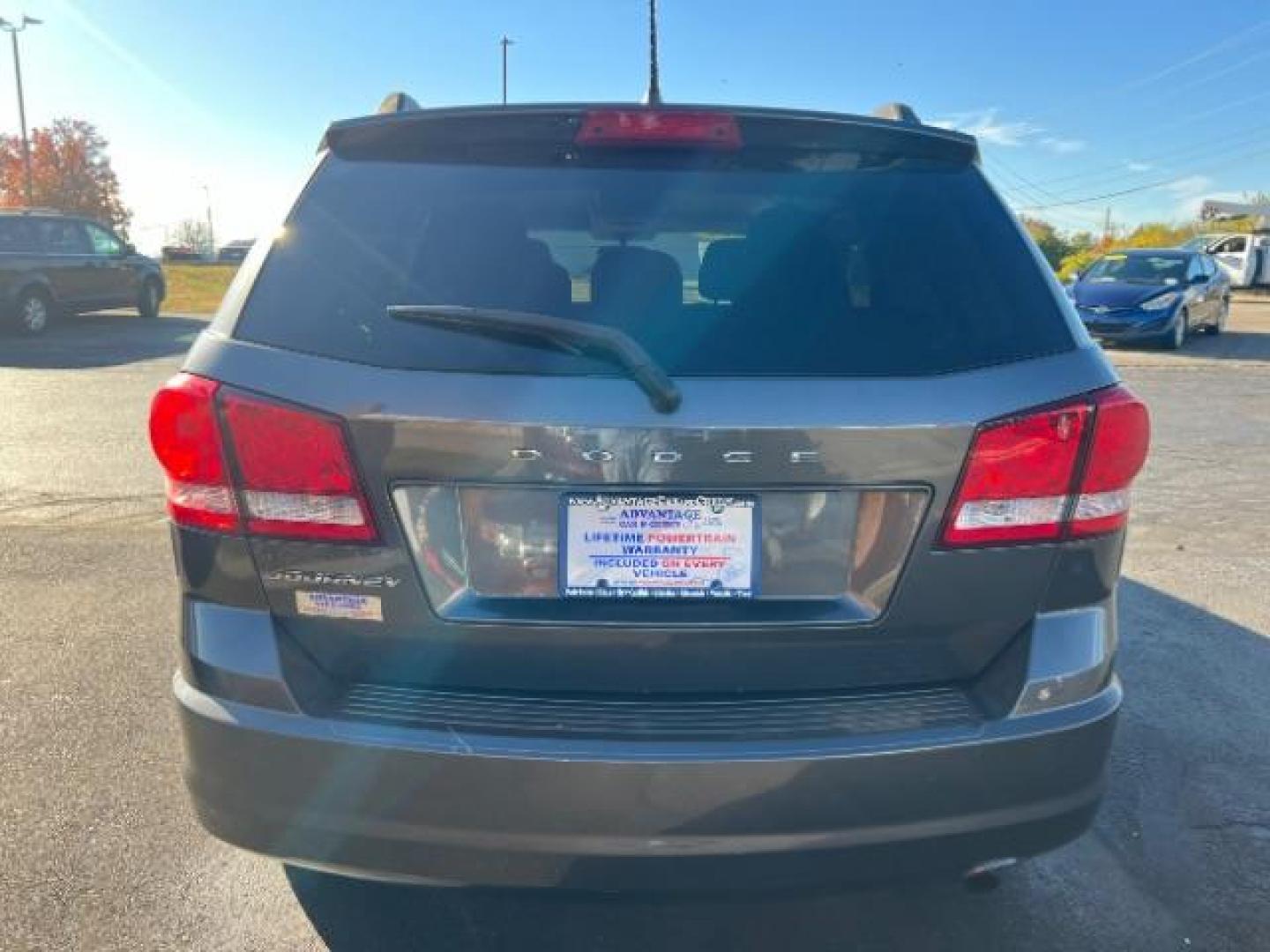 2014 Granite Crystal Met CC Dodge Journey SE (3C4PDCAB7ET) with an 2.4L L4 DOHC 16V engine, 4-Speed Automatic transmission, located at 880 E. National Road, Vandalia, OH, 45377, (937) 908-9800, 39.892189, -84.181015 - Photo#4