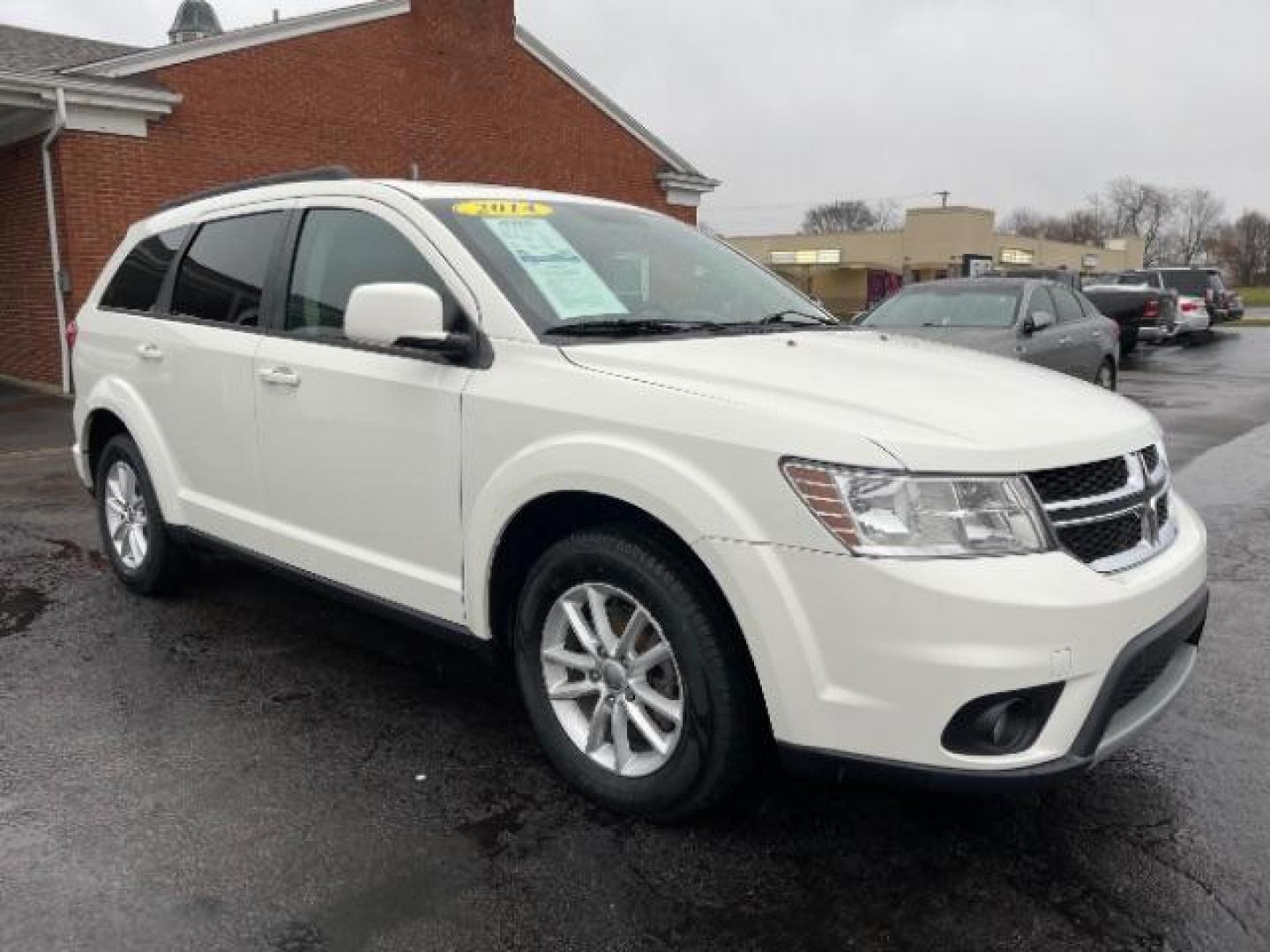 2014 Pearl White Tri-Coat Dodge Journey SXT (3C4PDCBG0ET) with an 3.6L V6 DOHC 24V engine, 6-Speed Automatic transmission, located at 880 E. National Road, Vandalia, OH, 45377, (937) 908-9800, 39.892189, -84.181015 - Photo#0