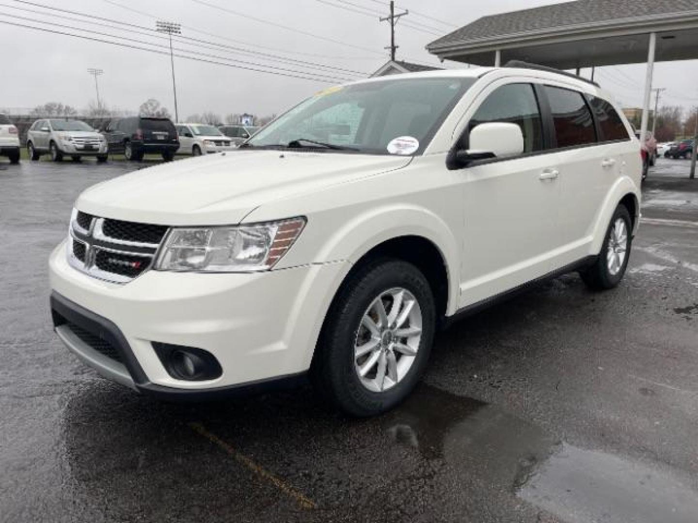 2014 Pearl White Tri-Coat Dodge Journey SXT (3C4PDCBG0ET) with an 3.6L V6 DOHC 24V engine, 6-Speed Automatic transmission, located at 880 E. National Road, Vandalia, OH, 45377, (937) 908-9800, 39.892189, -84.181015 - Photo#1