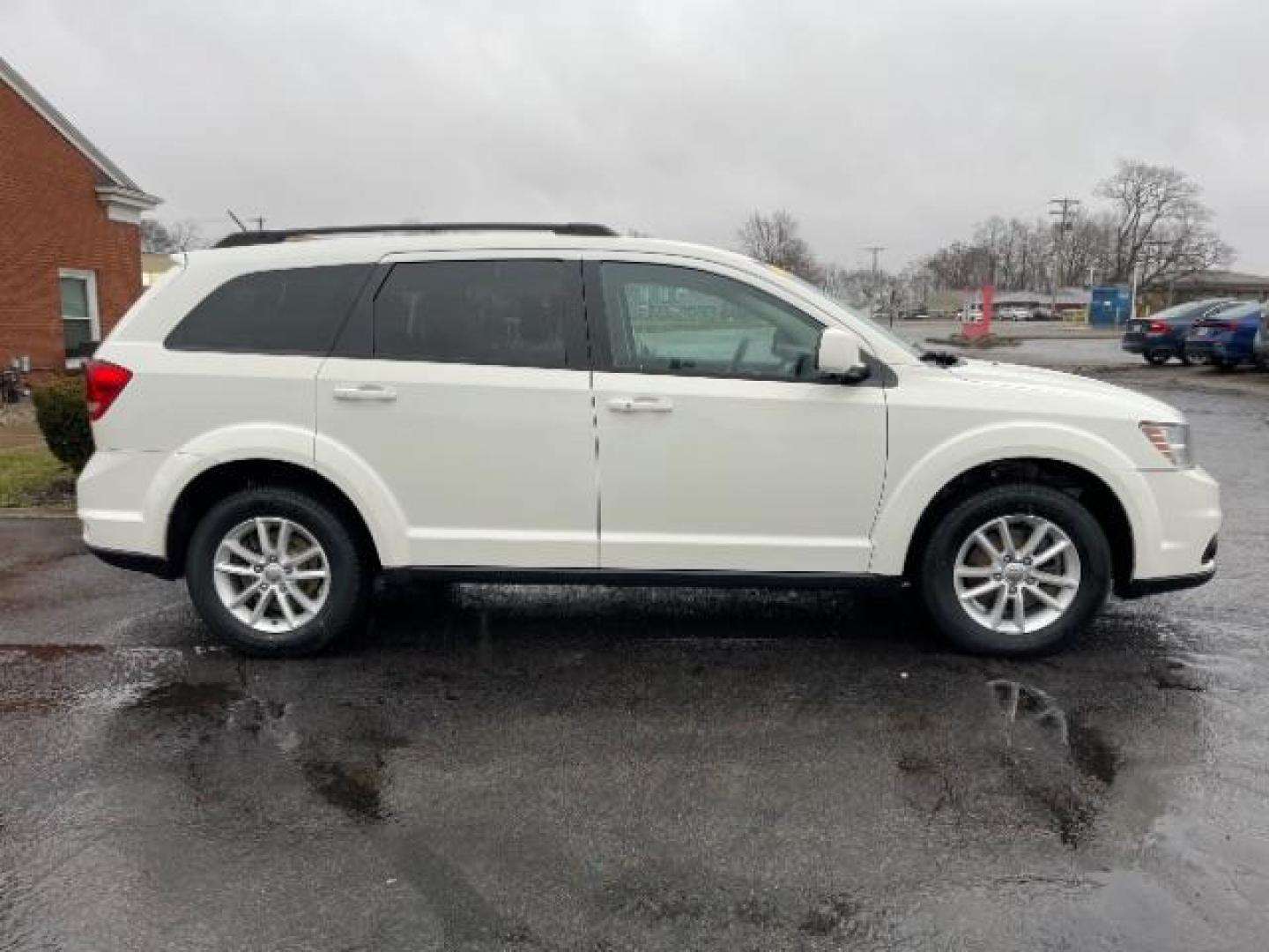 2014 Pearl White Tri-Coat Dodge Journey SXT (3C4PDCBG0ET) with an 3.6L V6 DOHC 24V engine, 6-Speed Automatic transmission, located at 880 E. National Road, Vandalia, OH, 45377, (937) 908-9800, 39.892189, -84.181015 - Photo#3