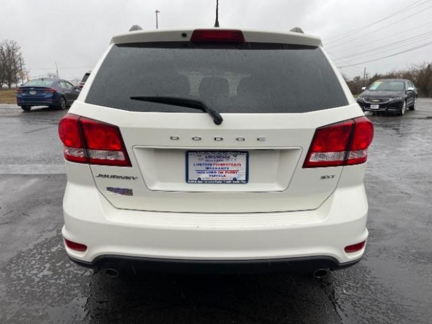 2014 Pearl White Tri-Coat Dodge Journey SXT (3C4PDCBG0ET) with an 3.6L V6 DOHC 24V engine, 6-Speed Automatic transmission, located at 880 E. National Road, Vandalia, OH, 45377, (937) 908-9800, 39.892189, -84.181015 - Photo#5