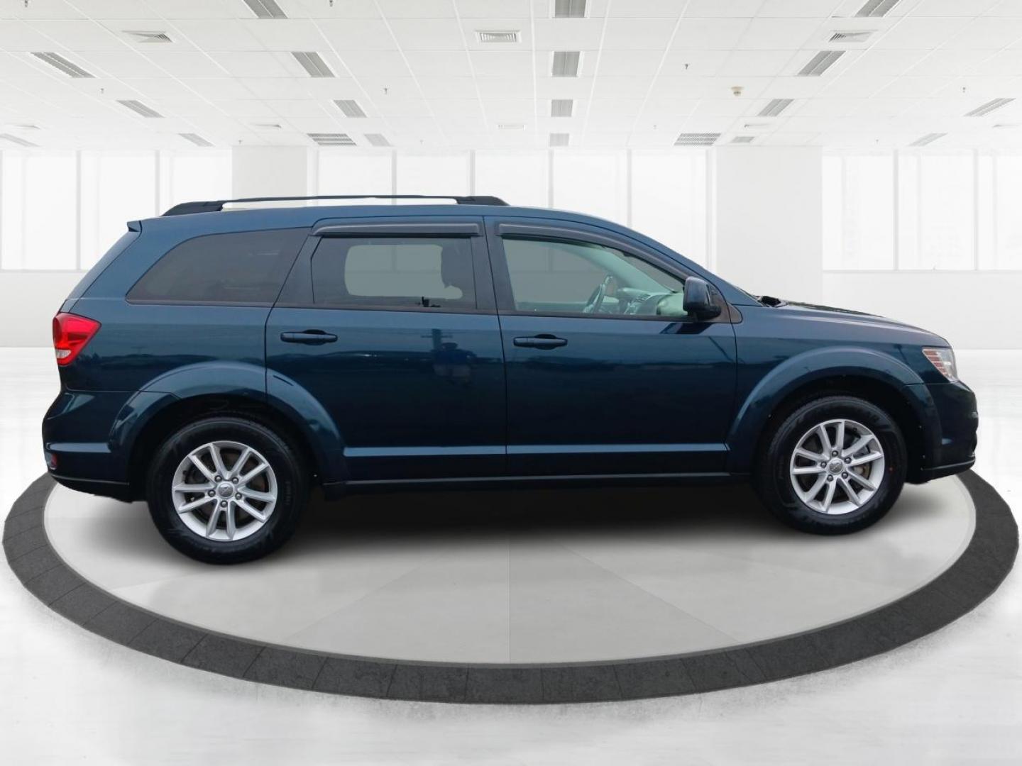 2014 Fathom Blue Pearlcoat Dodge Journey (3C4PDCBB1ET) with an 2.4L L6 DOHC 16V engine, 4-Speed Automatic transmission, located at 401 Woodman Dr, Riverside, OH, 45431, (937) 908-9800, 39.763779, -84.122063 - Photo#1