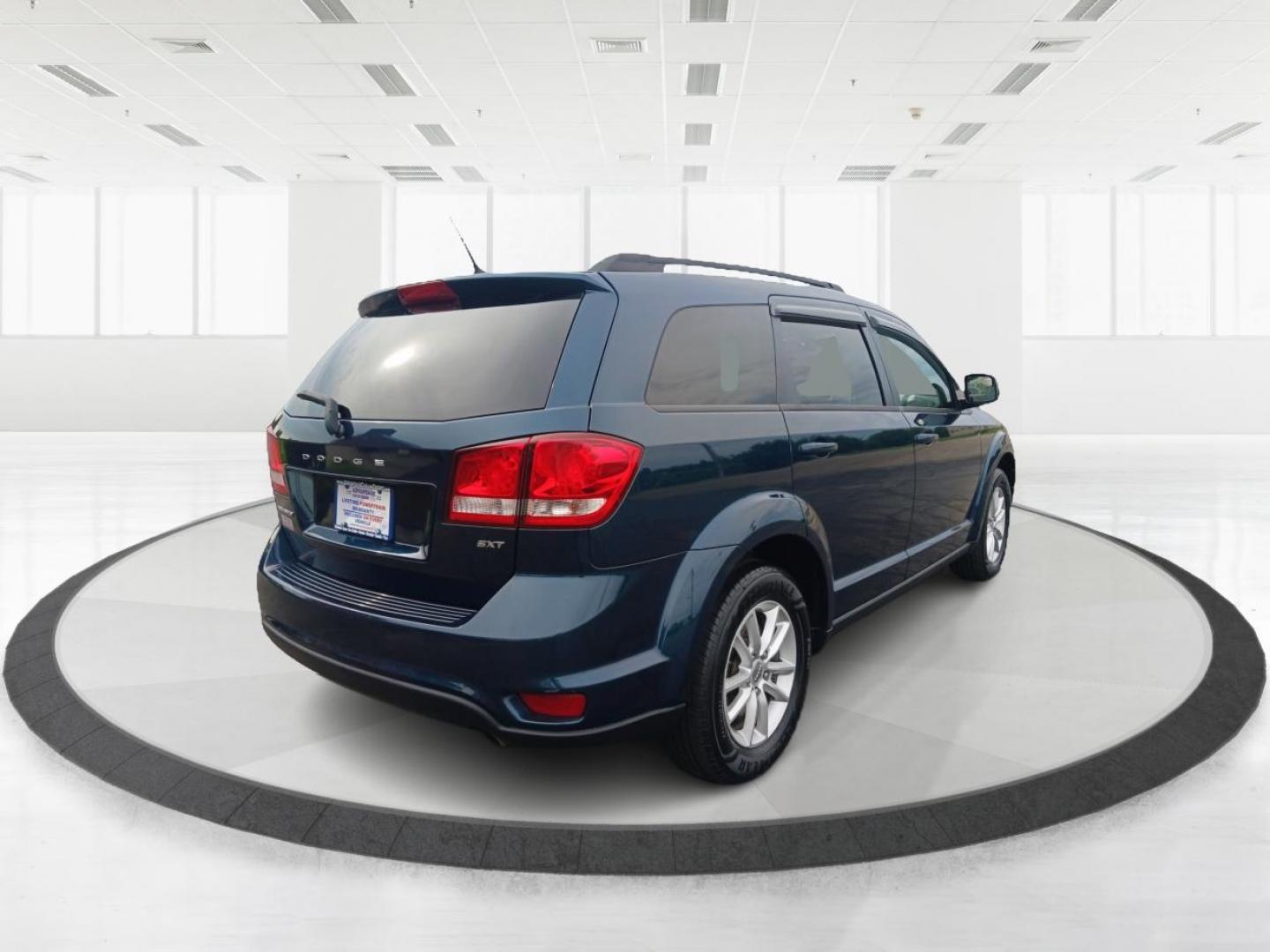 2014 Fathom Blue Pearlcoat Dodge Journey (3C4PDCBB1ET) with an 2.4L L6 DOHC 16V engine, 4-Speed Automatic transmission, located at 401 Woodman Dr, Riverside, OH, 45431, (937) 908-9800, 39.763779, -84.122063 - Photo#2