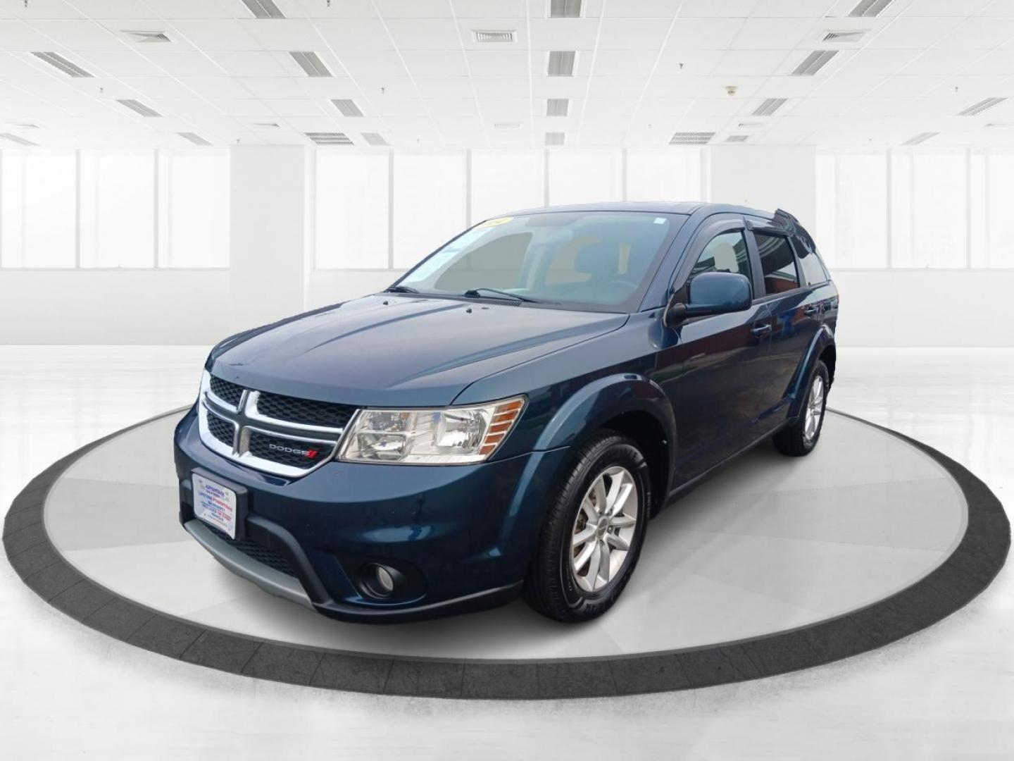 2014 Fathom Blue Pearlcoat Dodge Journey (3C4PDCBB1ET) with an 2.4L L6 DOHC 16V engine, 4-Speed Automatic transmission, located at 401 Woodman Dr, Riverside, OH, 45431, (937) 908-9800, 39.763779, -84.122063 - Photo#7