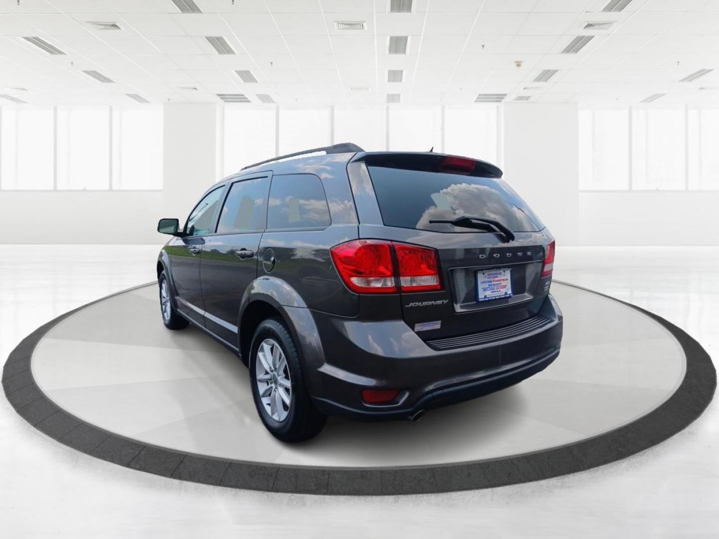 2014 Granite Crystal Met CC Dodge Journey (3C4PDCBG7ET) with an 3.6L V6 DOHC 24V engine, 6-Speed Automatic transmission, located at 4508 South Dixie Dr, Moraine, OH, 45439, (937) 908-9800, 39.690136, -84.216438 - Photo#4