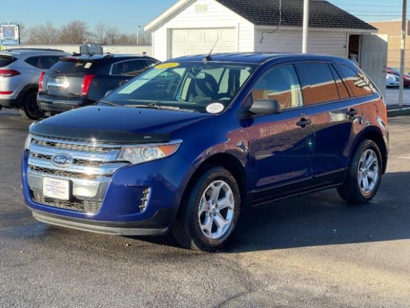 2014 Deep Impact Blue Metallic Ford Edge SE FWD (2FMDK3G93EB) with an 2.0L L4 DOHC 16V engine, 6-Speed Automatic transmission, located at 4508 South Dixie Dr, Moraine, OH, 45439, (937) 908-9800, 39.690136, -84.216438 - Photo#1