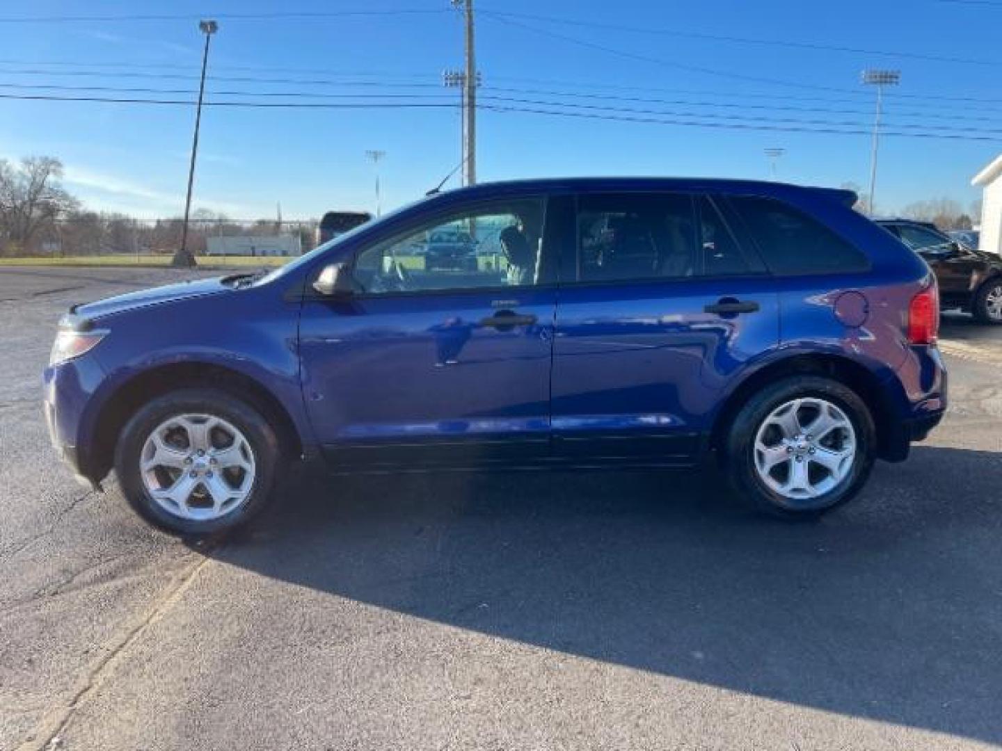 2014 Deep Impact Blue Metallic Ford Edge SE FWD (2FMDK3G93EB) with an 2.0L L4 DOHC 16V engine, 6-Speed Automatic transmission, located at 4508 South Dixie Dr, Moraine, OH, 45439, (937) 908-9800, 39.690136, -84.216438 - Photo#2