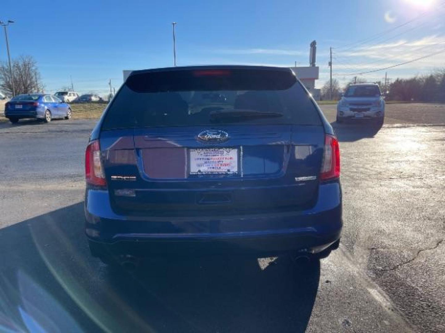 2014 Deep Impact Blue Metallic Ford Edge SE FWD (2FMDK3G93EB) with an 2.0L L4 DOHC 16V engine, 6-Speed Automatic transmission, located at 4508 South Dixie Dr, Moraine, OH, 45439, (937) 908-9800, 39.690136, -84.216438 - Photo#4