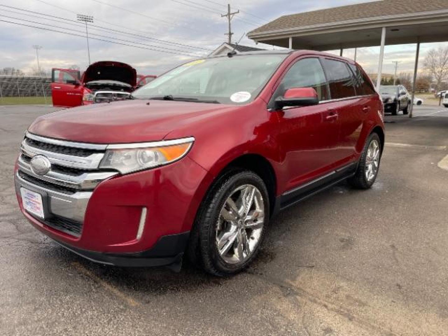 2014 Ruby Red Met Tinted CC Ford Edge Limited FWD (2FMDK3K94EB) with an 2.0L L4 DOHC 16V engine, 6-Speed Automatic transmission, located at 1951 S Dayton Lakeview Rd., New Carlisle, OH, 45344, (937) 908-9800, 39.890999, -84.050255 - Photo#1