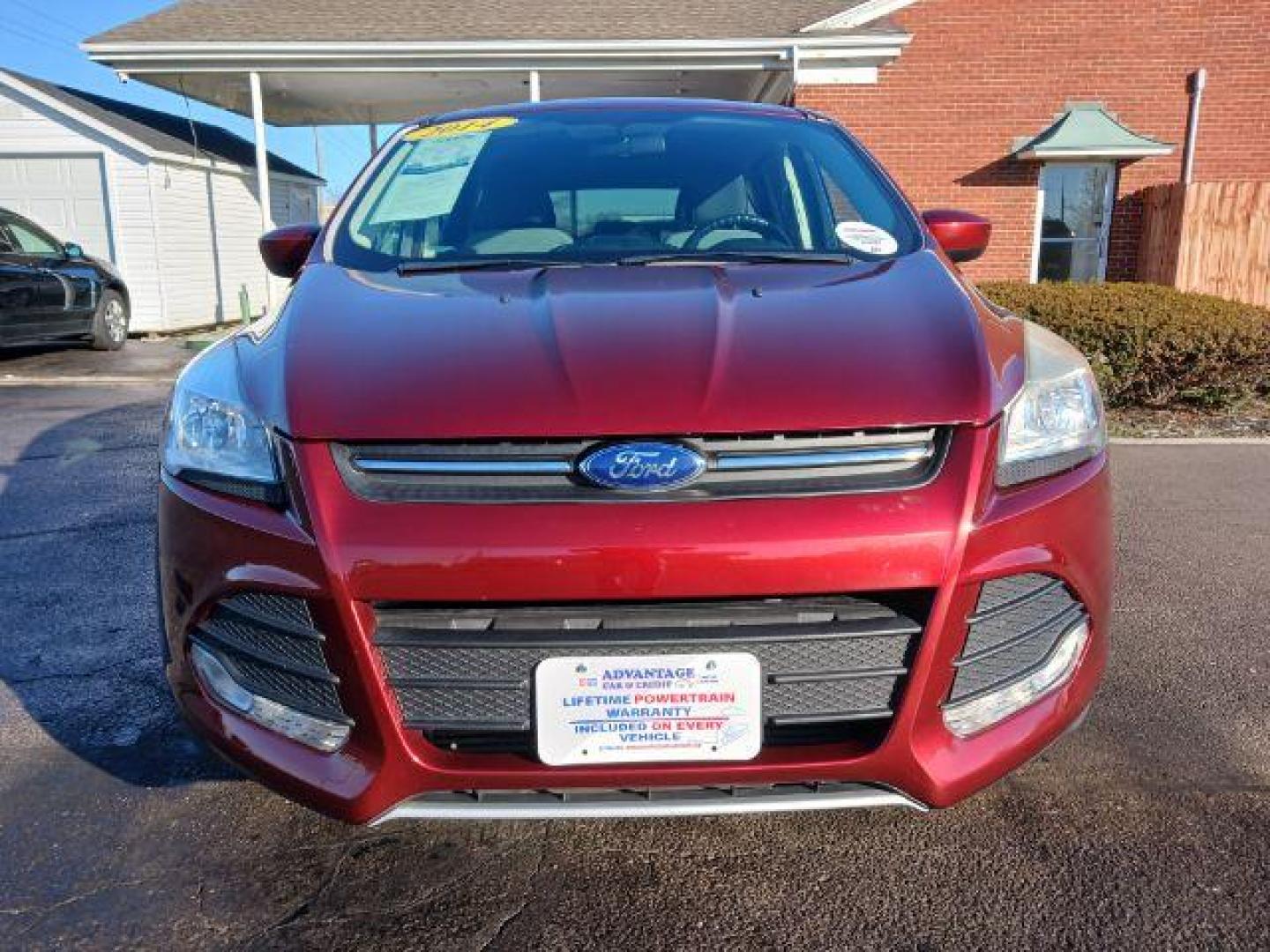 2014 Ruby Red Tinted CC Ford Escape SE FWD (1FMCU0G93EU) with an 2.0L L4 DOHC 16V engine, 6-Speed Automatic transmission, located at 401 Woodman Dr, Riverside, OH, 45431, (937) 908-9800, 39.763779, -84.122063 - Photo#1