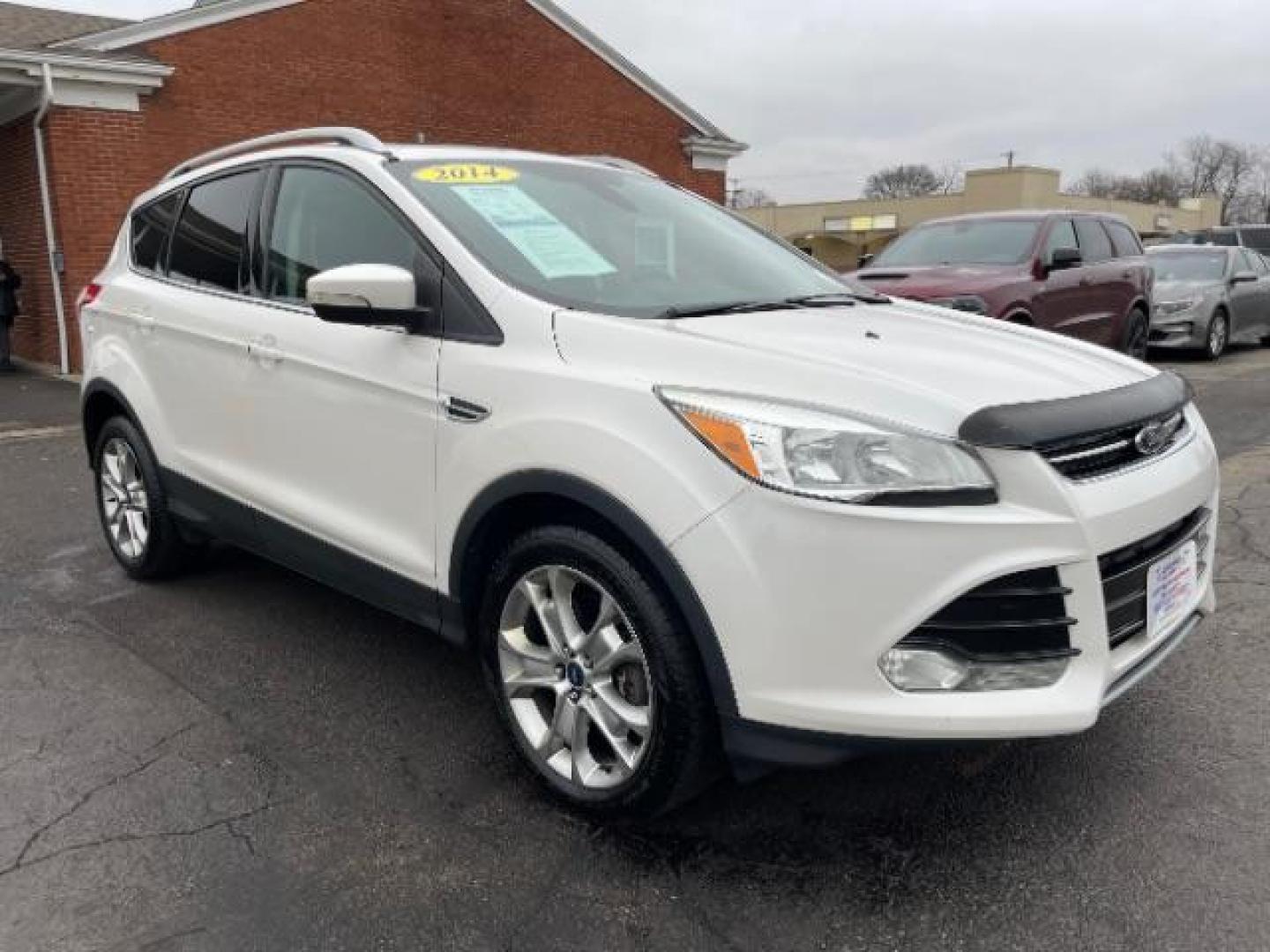 2014 White Platinum Tricoat Ford Escape Titanium 4WD (1FMCU9J95EU) with an 2.0L L4 DOHC 16V engine, 6-Speed Automatic transmission, located at 1951 S Dayton Lakeview Rd., New Carlisle, OH, 45344, (937) 908-9800, 39.890999, -84.050255 - Photo#0