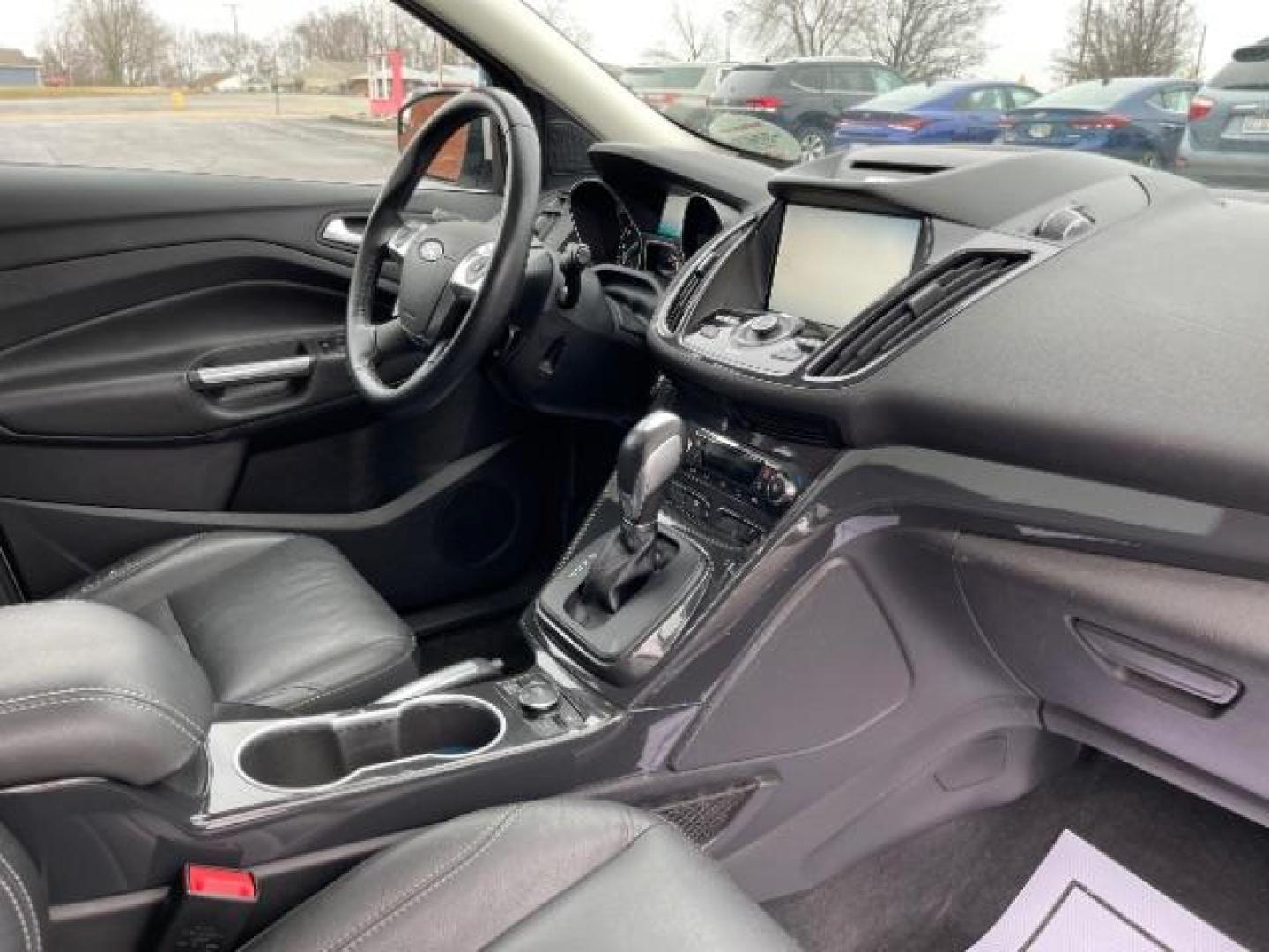 2014 White Platinum Tricoat Ford Escape Titanium 4WD (1FMCU9J95EU) with an 2.0L L4 DOHC 16V engine, 6-Speed Automatic transmission, located at 1951 S Dayton Lakeview Rd., New Carlisle, OH, 45344, (937) 908-9800, 39.890999, -84.050255 - Photo#7