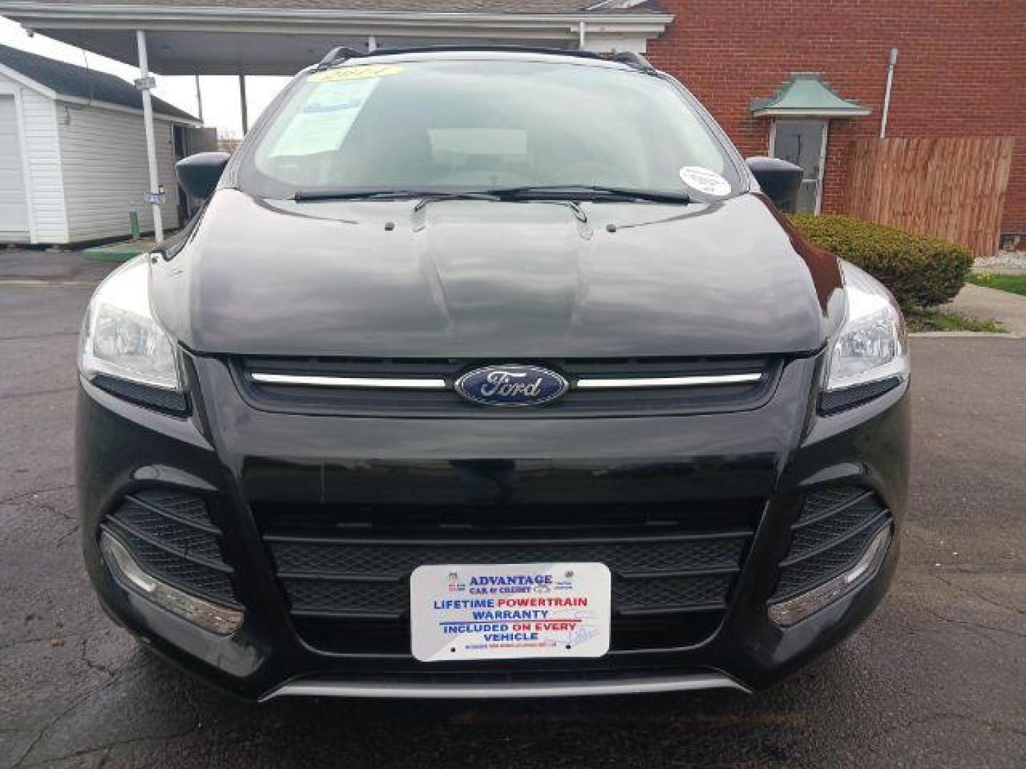 2014 Tuxedo Black Ford Escape SE 4WD (1FMCU9G99EU) with an 2.0L L4 DOHC 16V engine, 6-Speed Automatic transmission, located at 880 E. National Road, Vandalia, OH, 45377, (937) 908-9800, 39.892189, -84.181015 - Photo#1