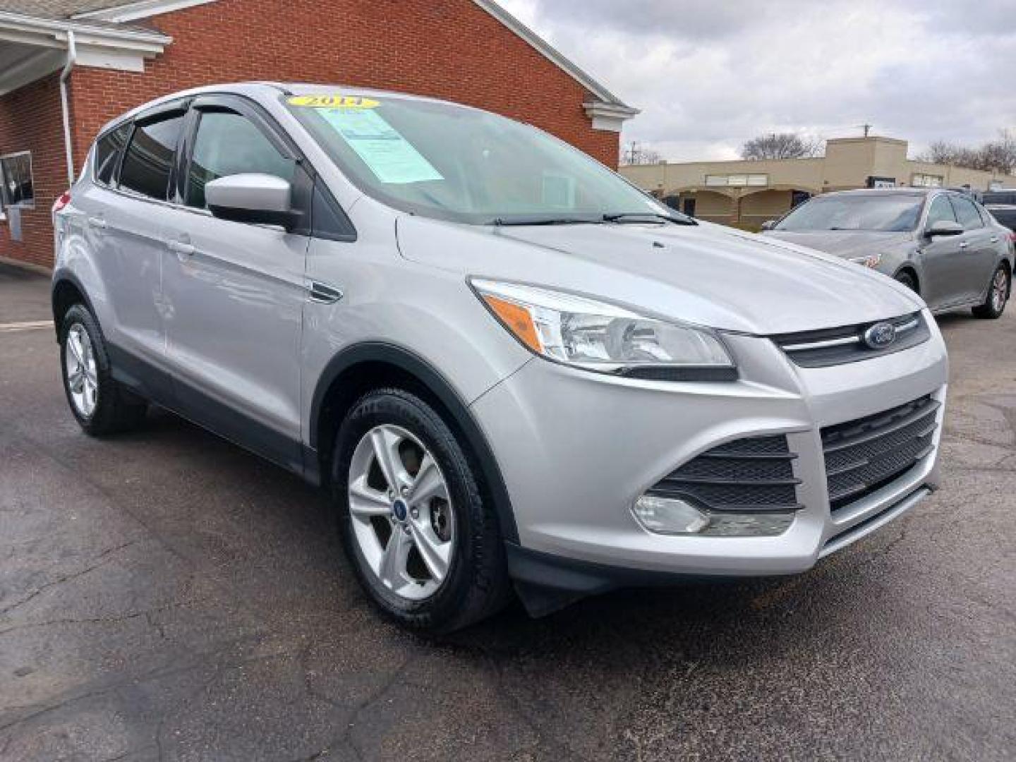 2014 Ingot Silver Metallic Ford Escape SE 4WD (1FMCU9G92EU) with an 2.0L L4 DOHC 16V engine, 6-Speed Automatic transmission, located at 1099 N County Rd 25A, OH, 45373, (937) 908-9800, 40.057079, -84.212883 - Photo#0