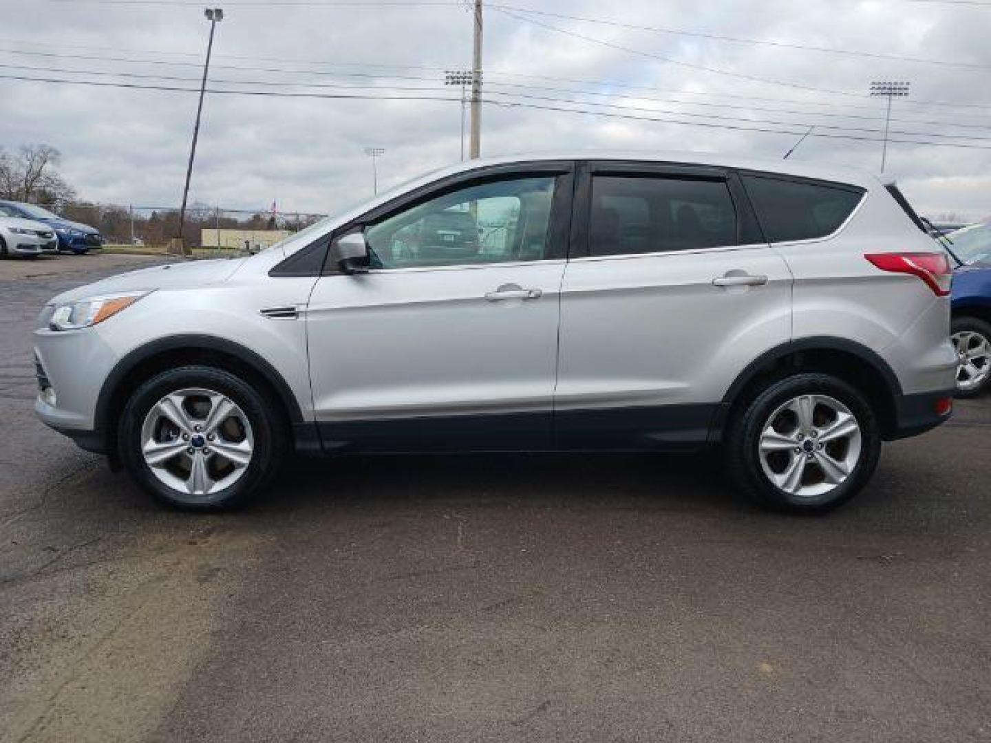 2014 Ingot Silver Metallic Ford Escape SE 4WD (1FMCU9G92EU) with an 2.0L L4 DOHC 16V engine, 6-Speed Automatic transmission, located at 1099 N County Rd 25A, OH, 45373, (937) 908-9800, 40.057079, -84.212883 - Photo#3