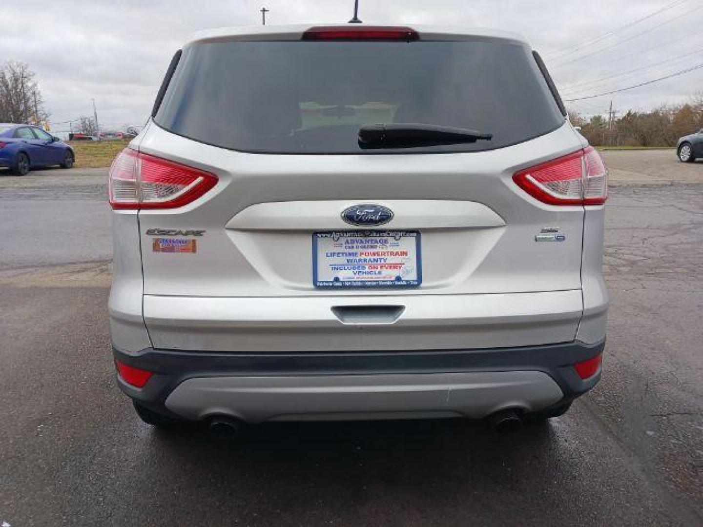 2014 Ingot Silver Metallic Ford Escape SE 4WD (1FMCU9G92EU) with an 2.0L L4 DOHC 16V engine, 6-Speed Automatic transmission, located at 1099 N County Rd 25A, OH, 45373, (937) 908-9800, 40.057079, -84.212883 - Photo#5