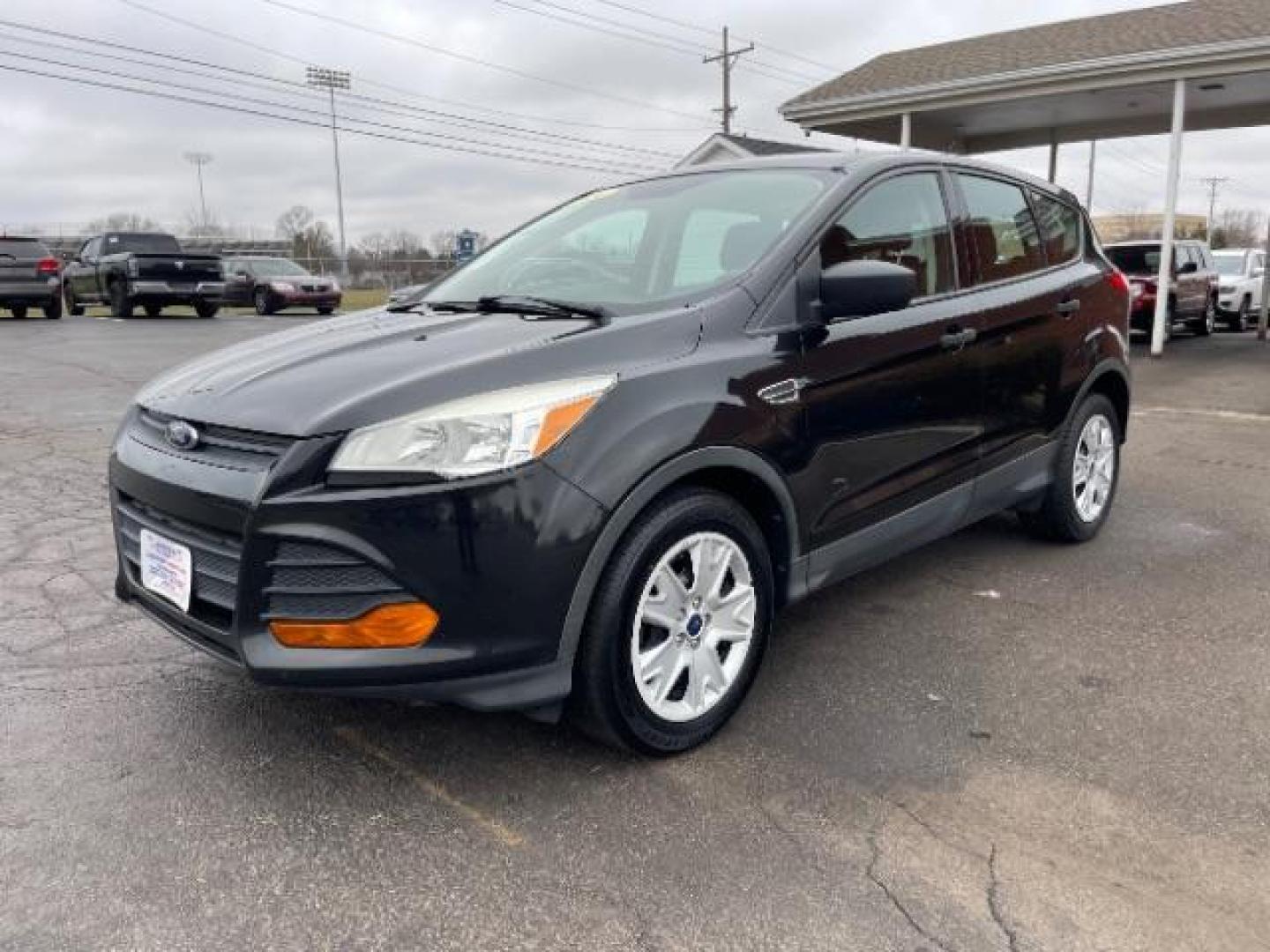 2014 Tuxedo Black Ford Escape S FWD (1FMCU0F78EU) with an 2.5L L4 DOHC 16V engine, 6-Speed Automatic transmission, located at 1099 N County Rd 25A, OH, 45373, (937) 908-9800, 40.057079, -84.212883 - Photo#1