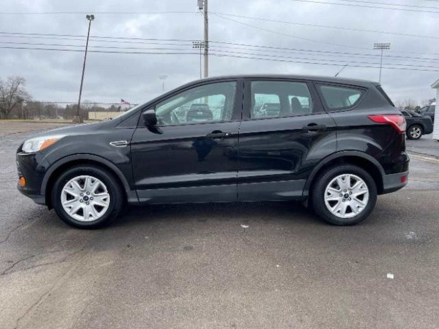 2014 Tuxedo Black Ford Escape S FWD (1FMCU0F78EU) with an 2.5L L4 DOHC 16V engine, 6-Speed Automatic transmission, located at 1099 N County Rd 25A, OH, 45373, (937) 908-9800, 40.057079, -84.212883 - Photo#2