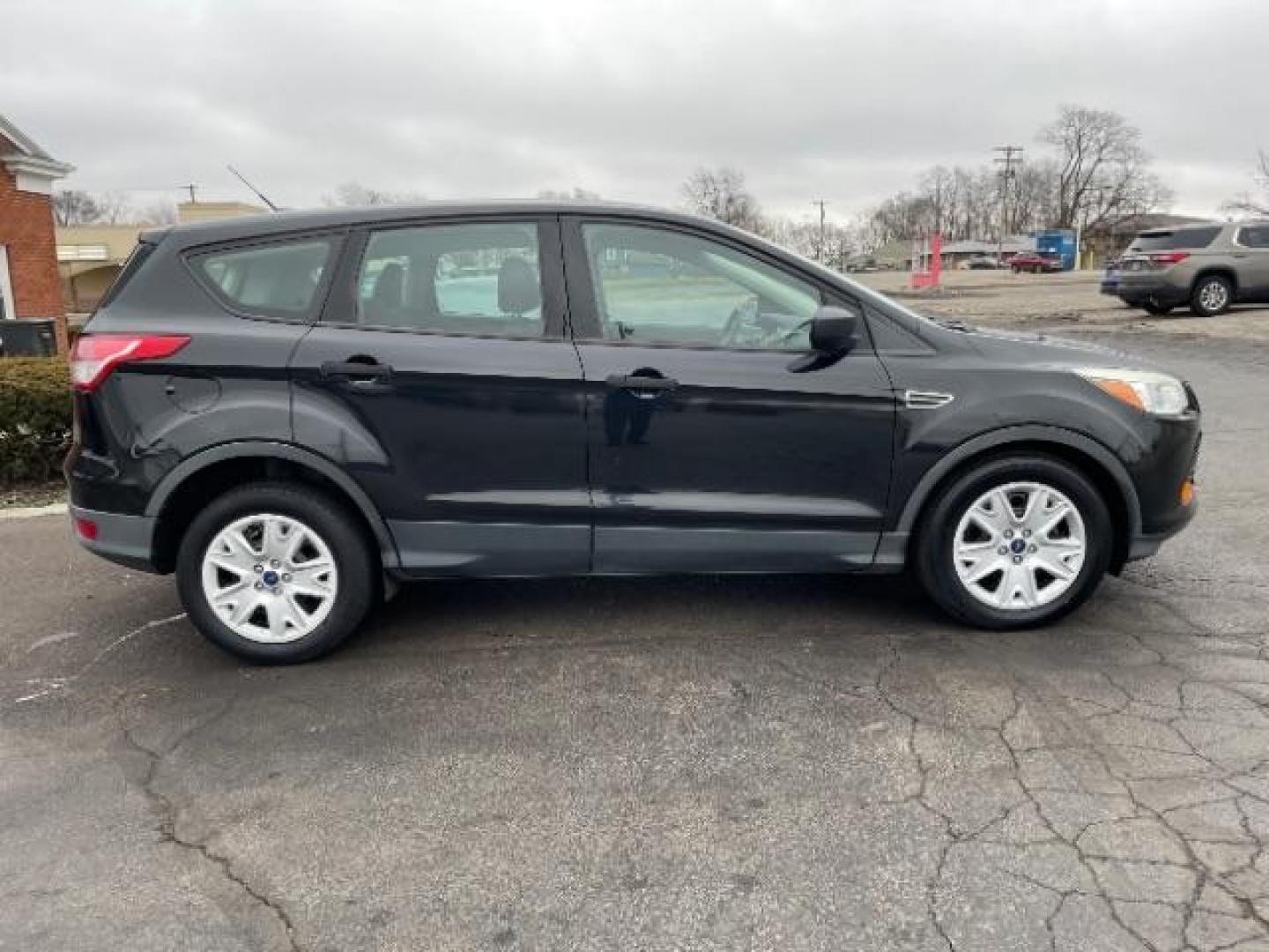 2014 Tuxedo Black Ford Escape S FWD (1FMCU0F78EU) with an 2.5L L4 DOHC 16V engine, 6-Speed Automatic transmission, located at 1099 N County Rd 25A, OH, 45373, (937) 908-9800, 40.057079, -84.212883 - Photo#3