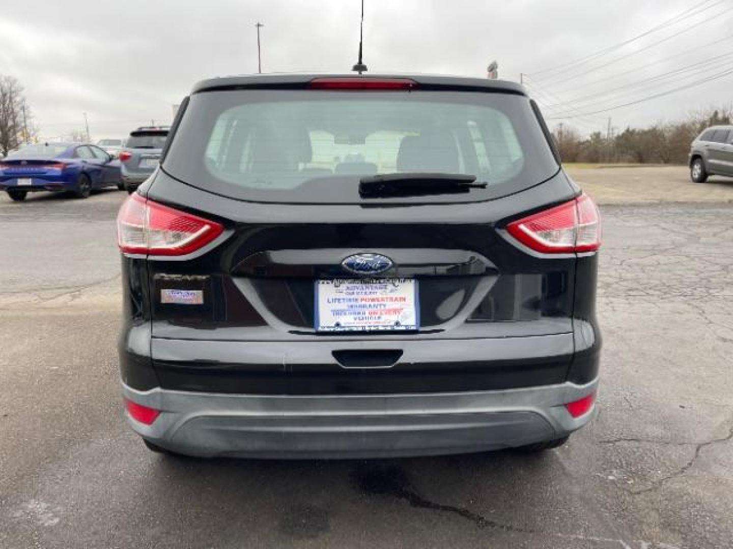 2014 Tuxedo Black Ford Escape S FWD (1FMCU0F78EU) with an 2.5L L4 DOHC 16V engine, 6-Speed Automatic transmission, located at 1099 N County Rd 25A, OH, 45373, (937) 908-9800, 40.057079, -84.212883 - Photo#4