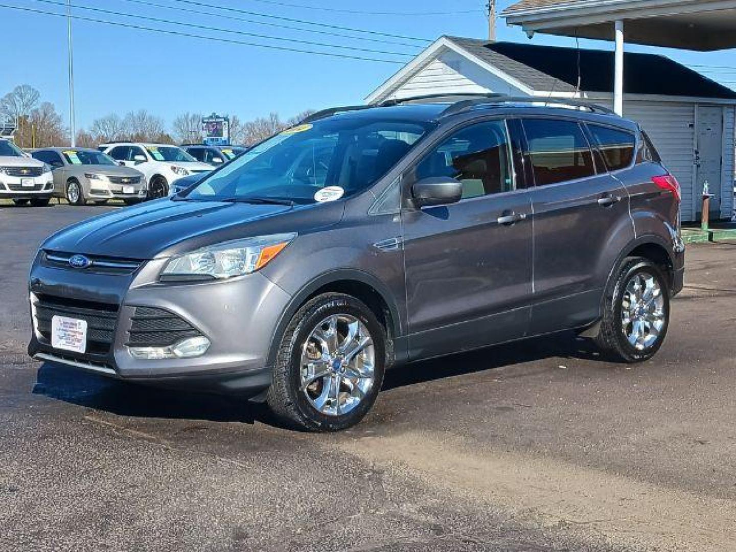 2014 Sterling Gray Metallic Ford Escape SE 4WD (1FMCU9G98EU) with an 2.0L L4 DOHC 16V engine, 6-Speed Automatic transmission, located at 401 Woodman Dr, Riverside, OH, 45431, (937) 908-9800, 39.763779, -84.122063 - Photo#2