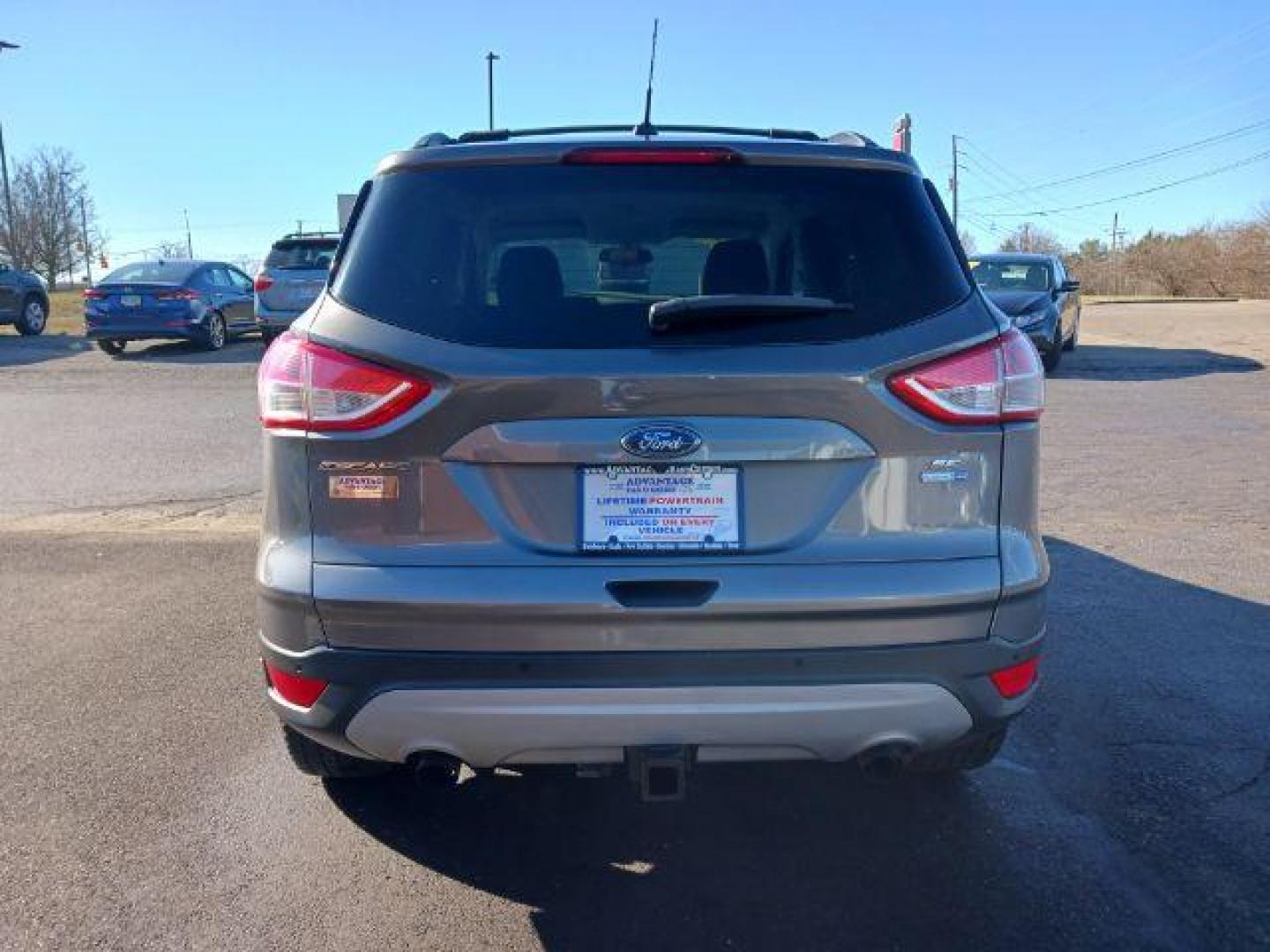 2014 Sterling Gray Metallic Ford Escape SE 4WD (1FMCU9G98EU) with an 2.0L L4 DOHC 16V engine, 6-Speed Automatic transmission, located at 401 Woodman Dr, Riverside, OH, 45431, (937) 908-9800, 39.763779, -84.122063 - Photo#5