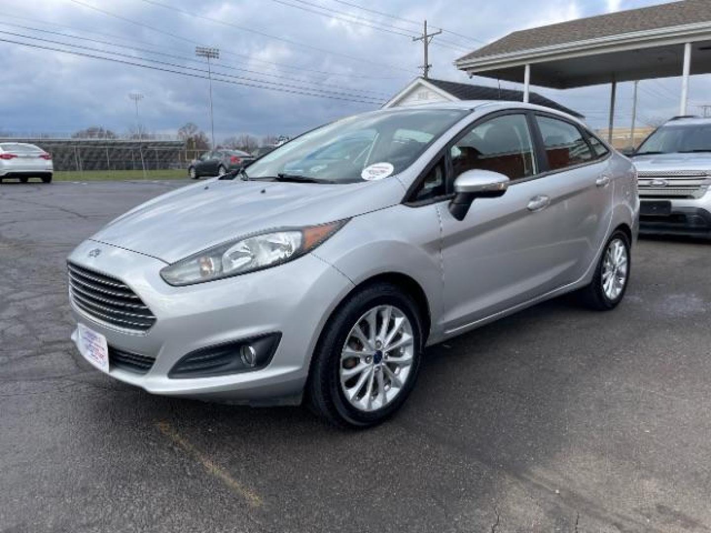 2014 Ingot Silver Metallic Ford Fiesta SE Sedan (3FADP4BJ6EM) with an 1.6L L4 DOHC 16V engine, located at 401 Woodman Dr, Riverside, OH, 45431, (937) 908-9800, 39.763779, -84.122063 - Photo#1