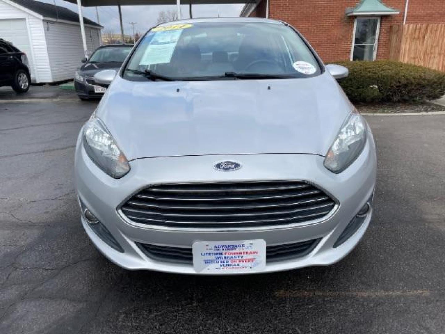 2014 Ingot Silver Metallic Ford Fiesta SE Sedan (3FADP4BJ6EM) with an 1.6L L4 DOHC 16V engine, located at 401 Woodman Dr, Riverside, OH, 45431, (937) 908-9800, 39.763779, -84.122063 - Photo#2