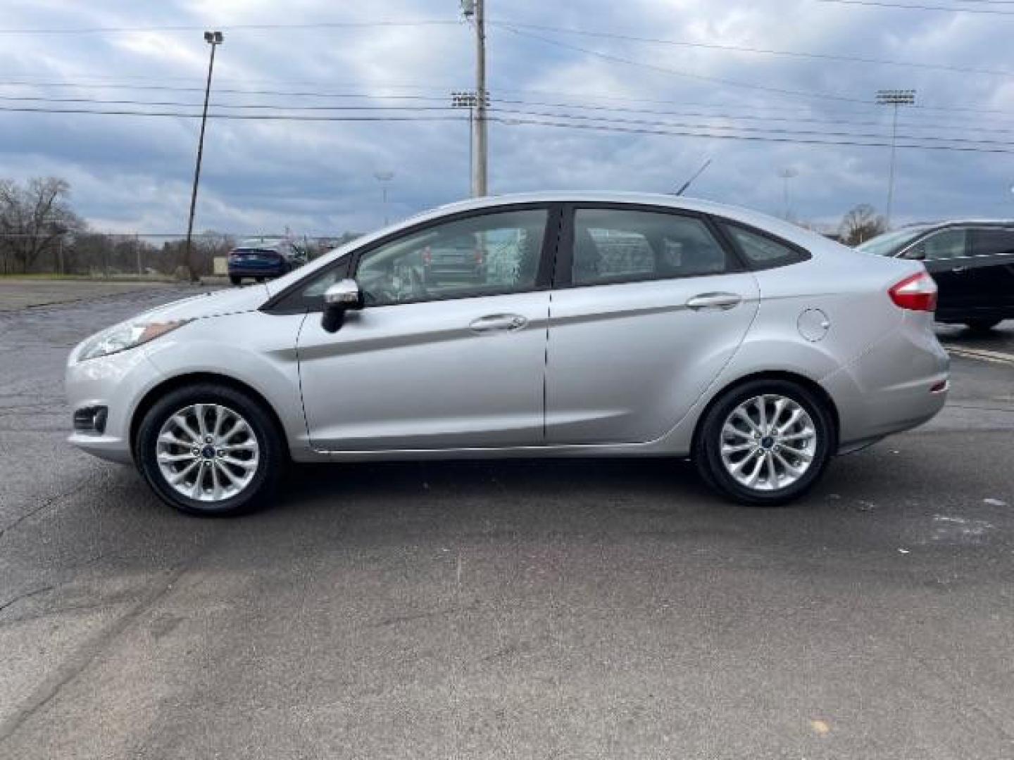 2014 Ingot Silver Metallic Ford Fiesta SE Sedan (3FADP4BJ6EM) with an 1.6L L4 DOHC 16V engine, located at 401 Woodman Dr, Riverside, OH, 45431, (937) 908-9800, 39.763779, -84.122063 - Photo#4