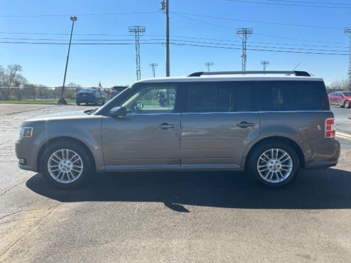 2014 Mineral Gray Metallic Ford Flex SEL FWD (2FMGK5C84EB) with an 3.5L V6 DOHC 24V engine, 6-Speed Automatic Overdrive transmission, located at 1099 N County Rd 25A, OH, 45373, (937) 908-9800, 40.057079, -84.212883 - Photo#3