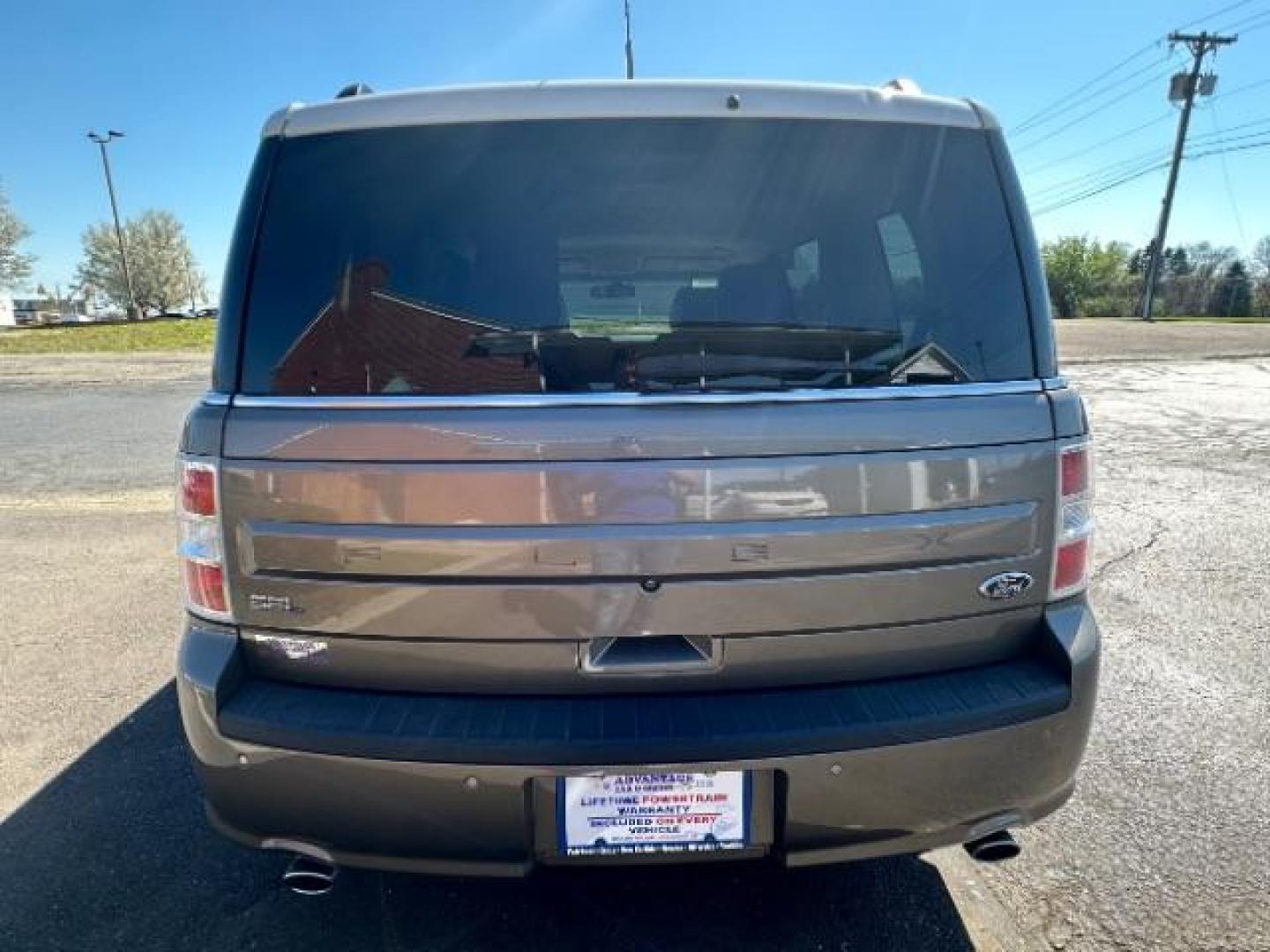 2014 Mineral Gray Metallic Ford Flex SEL FWD (2FMGK5C84EB) with an 3.5L V6 DOHC 24V engine, 6-Speed Automatic Overdrive transmission, located at 1099 N County Rd 25A, OH, 45373, (937) 908-9800, 40.057079, -84.212883 - Photo#4