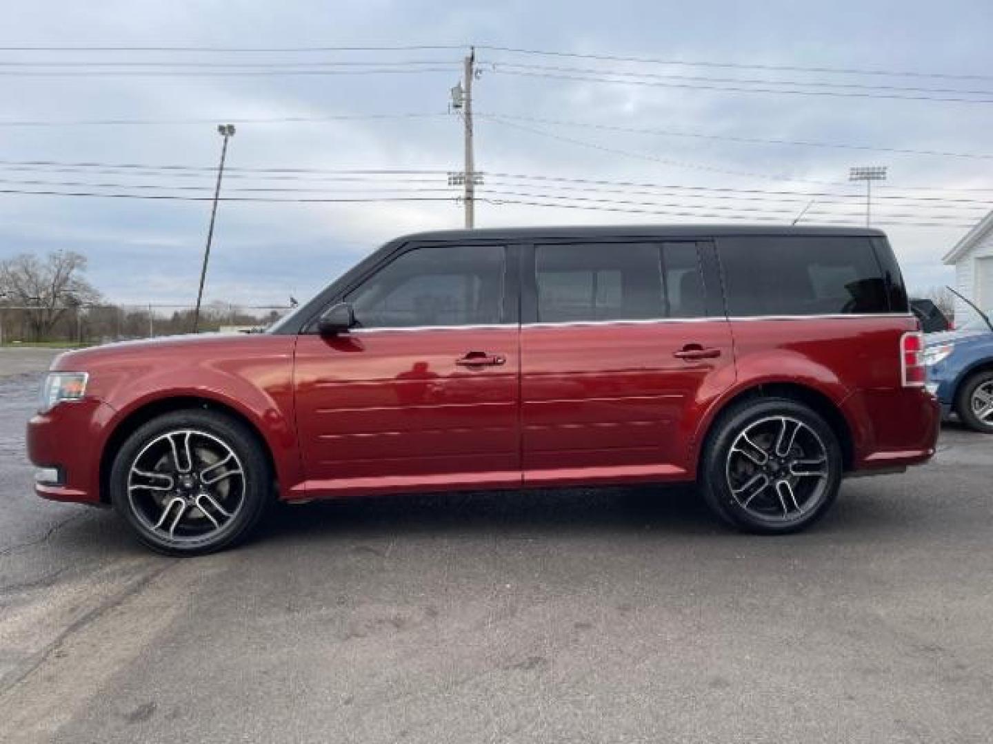 2014 Orange Ford Flex SEL FWD (2FMGK5C89EB) with an 3.5L V6 DOHC 24V engine, 6-Speed Automatic Overdrive transmission, located at 401 Woodman Dr, Riverside, OH, 45431, (937) 908-9800, 39.763779, -84.122063 - Photo#3