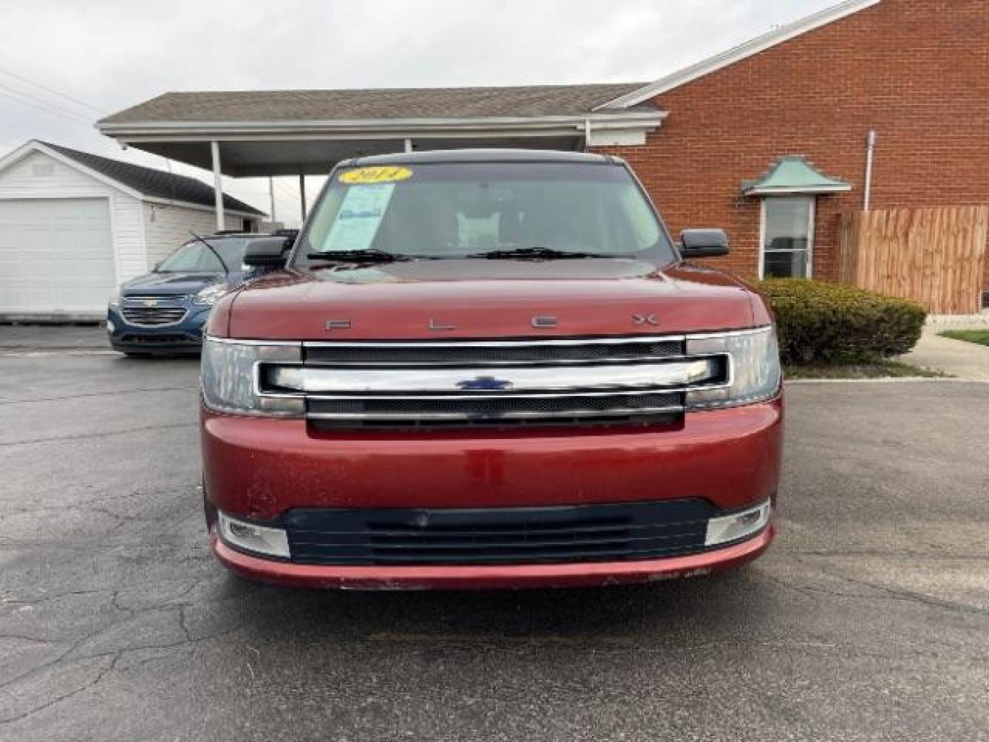 2014 Orange Ford Flex SEL FWD (2FMGK5C89EB) with an 3.5L V6 DOHC 24V engine, 6-Speed Automatic Overdrive transmission, located at 401 Woodman Dr, Riverside, OH, 45431, (937) 908-9800, 39.763779, -84.122063 - Photo#4