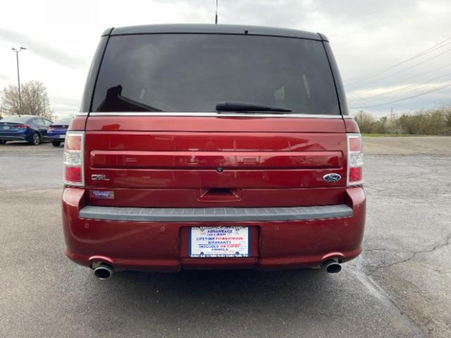 2014 Orange Ford Flex SEL FWD (2FMGK5C89EB) with an 3.5L V6 DOHC 24V engine, 6-Speed Automatic Overdrive transmission, located at 401 Woodman Dr, Riverside, OH, 45431, (937) 908-9800, 39.763779, -84.122063 - Photo#5