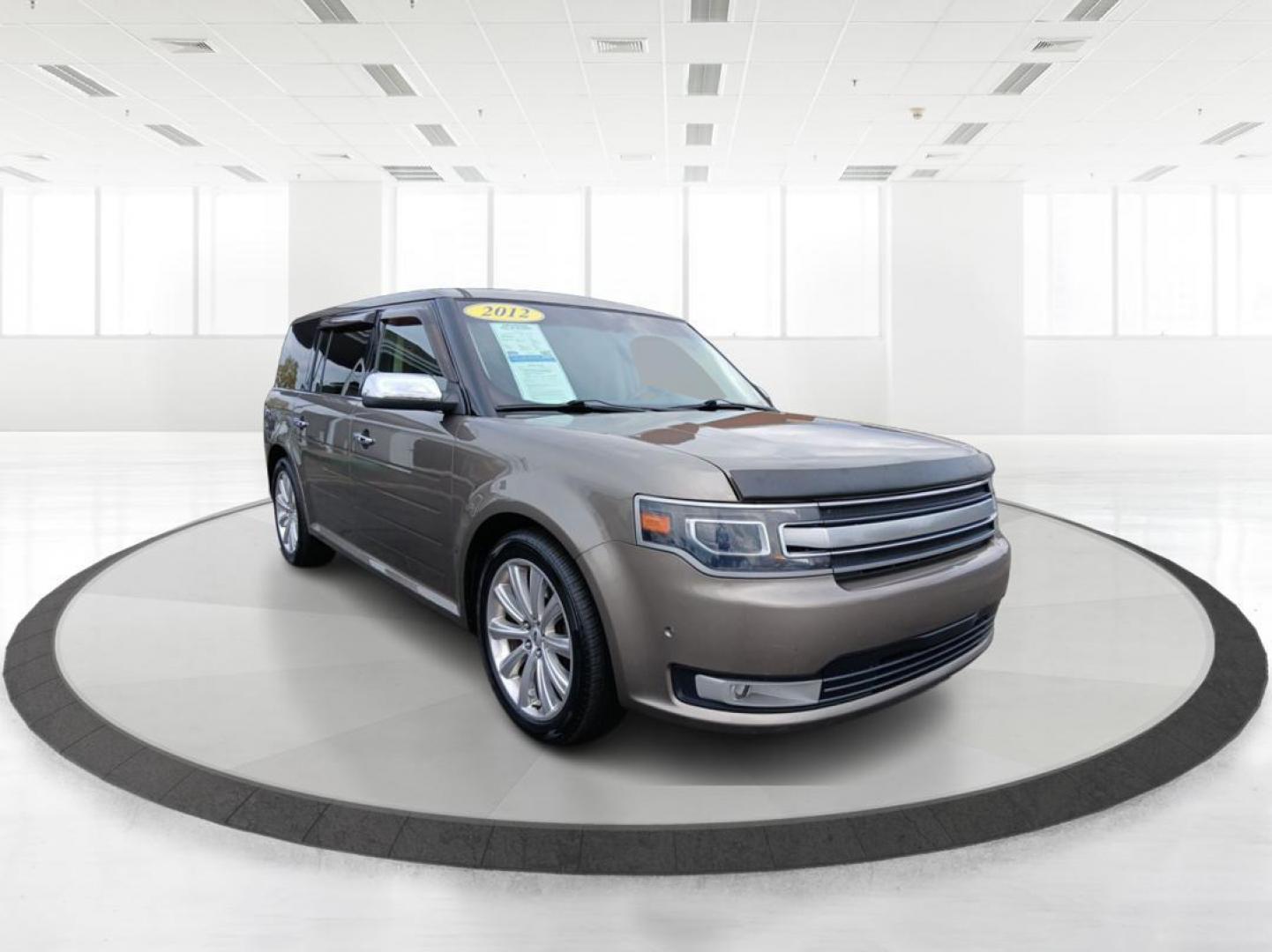 2014 Mineral Gray Metallic Ford Flex Limited AWD w/EcoBoost (2FMHK6DTXEB) with an 3.5L V6 DOHC 24V engine, 6-Speed Automatic Overdrive transmission, located at 401 Woodman Dr, Riverside, OH, 45431, (937) 908-9800, 39.763779, -84.122063 - Photo#0