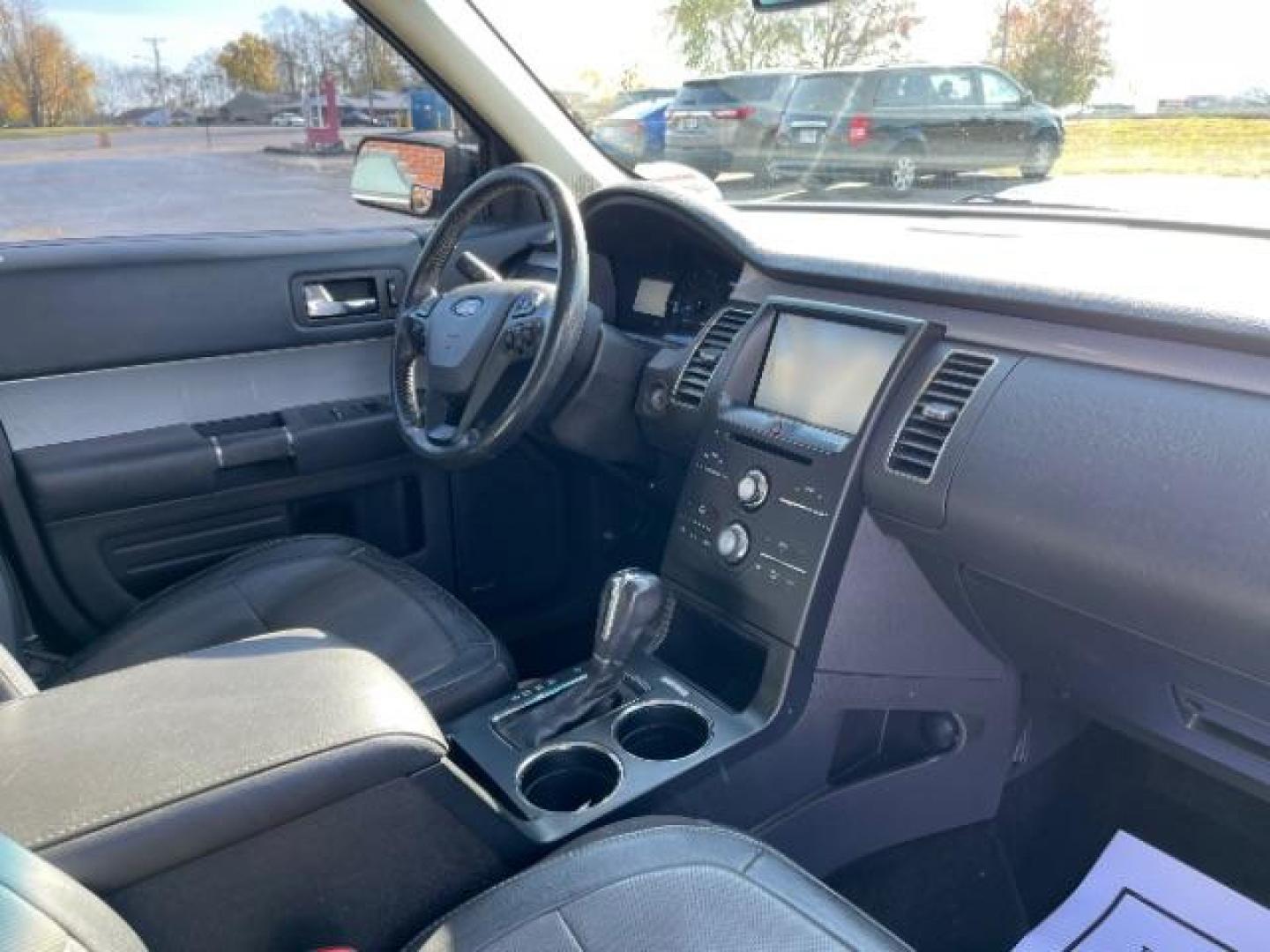 2014 Ruby Red Met Tinted CC Ford Flex SEL AWD (2FMHK6C86EB) with an 3.5L V6 DOHC 24V engine, 6-Speed Automatic Overdrive transmission, located at 880 E. National Road, Vandalia, OH, 45377, (937) 908-9800, 39.892189, -84.181015 - Photo#12