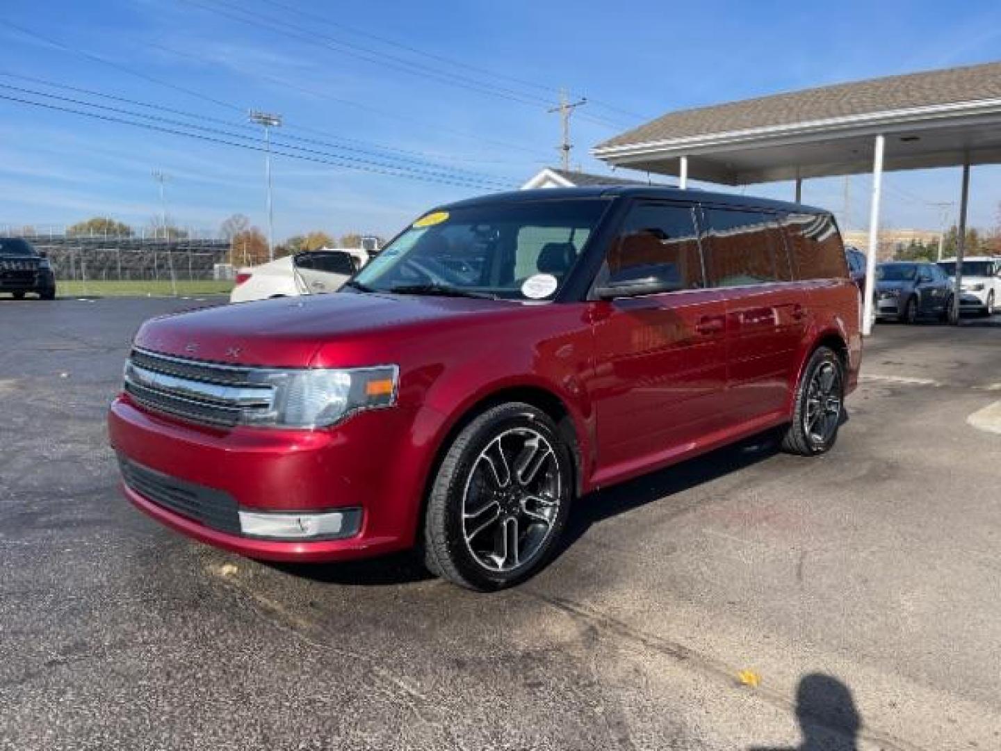 2014 Ruby Red Met Tinted CC Ford Flex SEL AWD (2FMHK6C86EB) with an 3.5L V6 DOHC 24V engine, 6-Speed Automatic Overdrive transmission, located at 880 E. National Road, Vandalia, OH, 45377, (937) 908-9800, 39.892189, -84.181015 - Photo#2