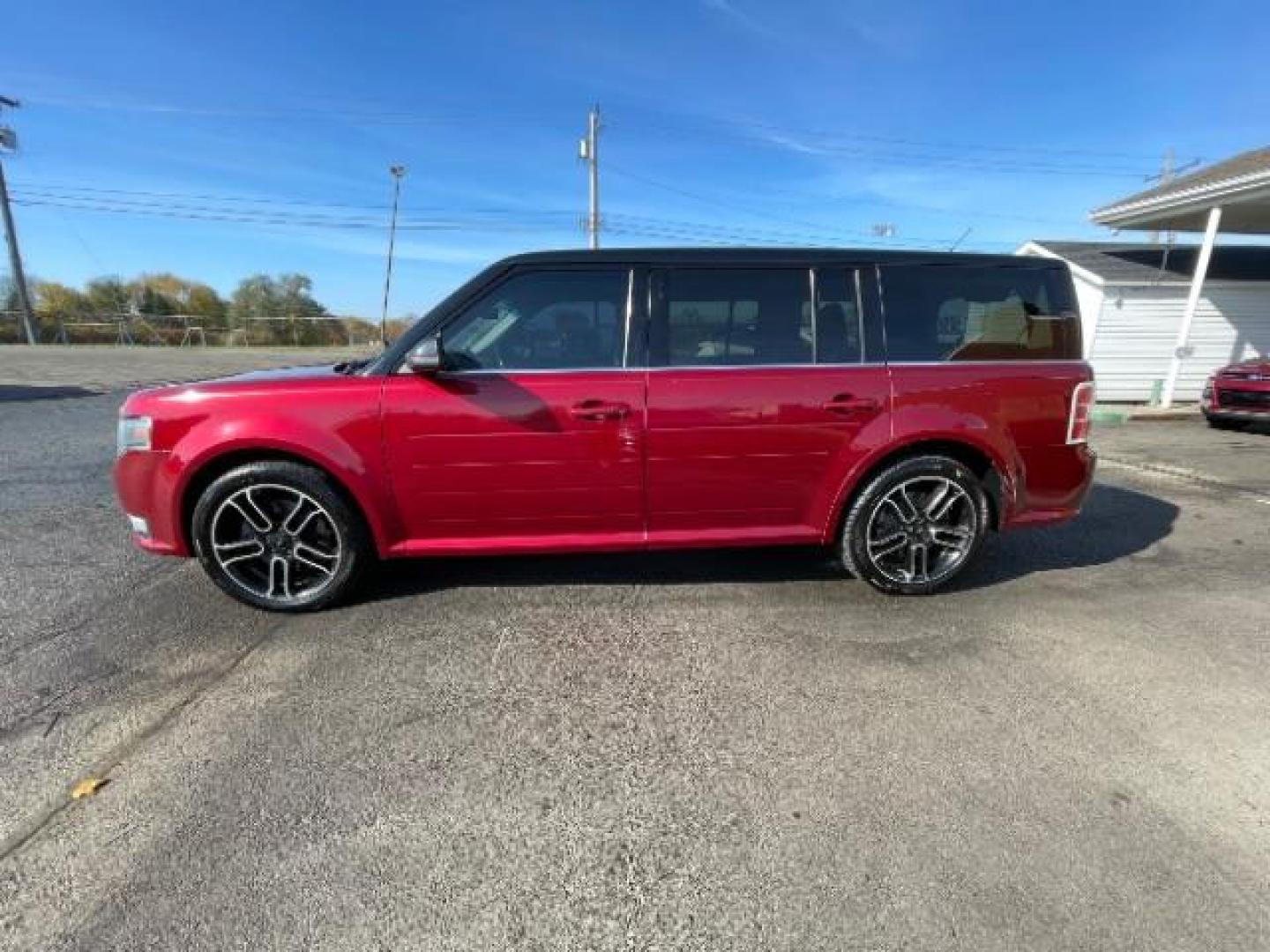 2014 Ruby Red Met Tinted CC Ford Flex SEL AWD (2FMHK6C86EB) with an 3.5L V6 DOHC 24V engine, 6-Speed Automatic Overdrive transmission, located at 880 E. National Road, Vandalia, OH, 45377, (937) 908-9800, 39.892189, -84.181015 - Photo#3