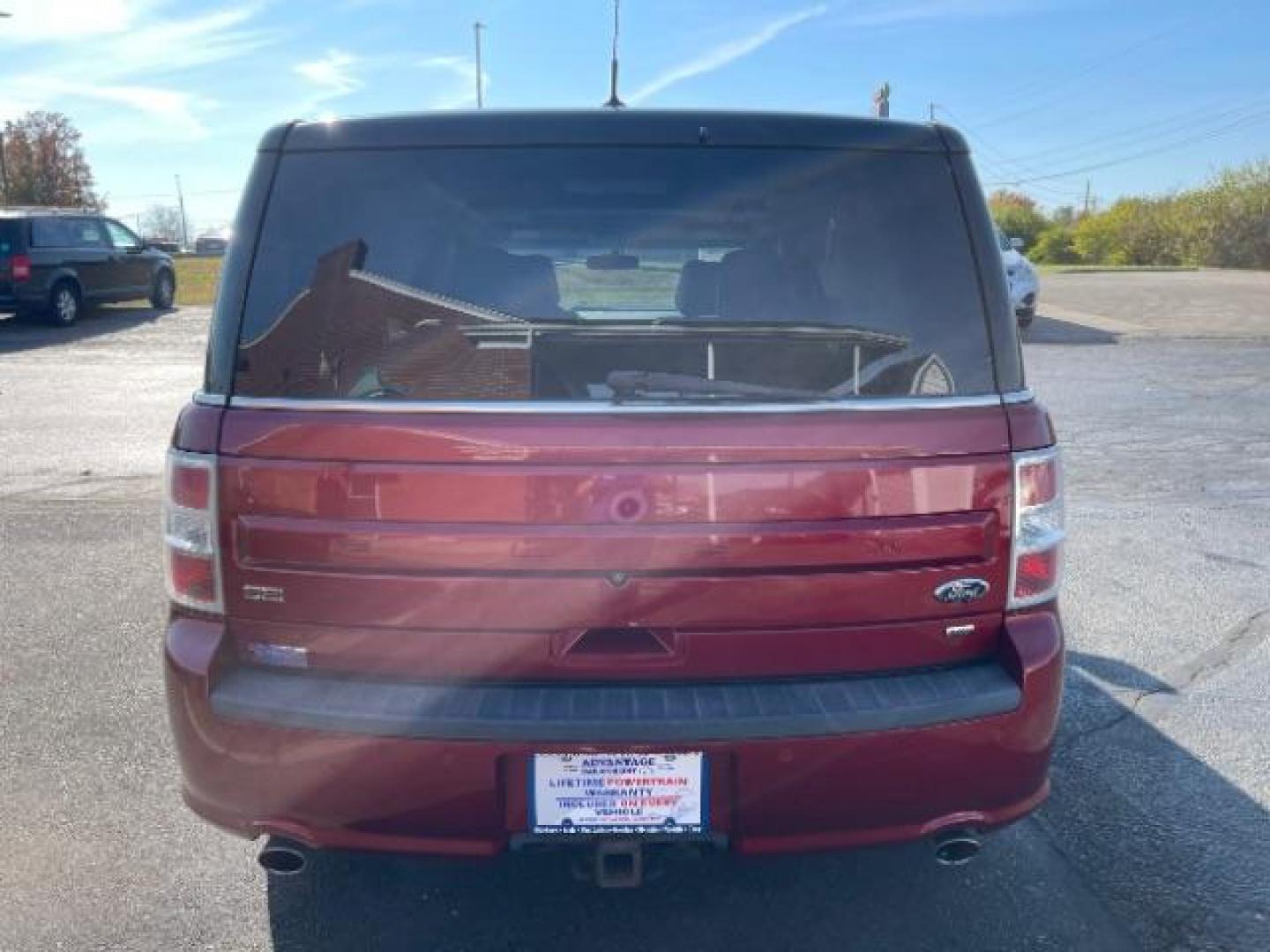 2014 Ruby Red Met Tinted CC Ford Flex SEL AWD (2FMHK6C86EB) with an 3.5L V6 DOHC 24V engine, 6-Speed Automatic Overdrive transmission, located at 880 E. National Road, Vandalia, OH, 45377, (937) 908-9800, 39.892189, -84.181015 - Photo#4