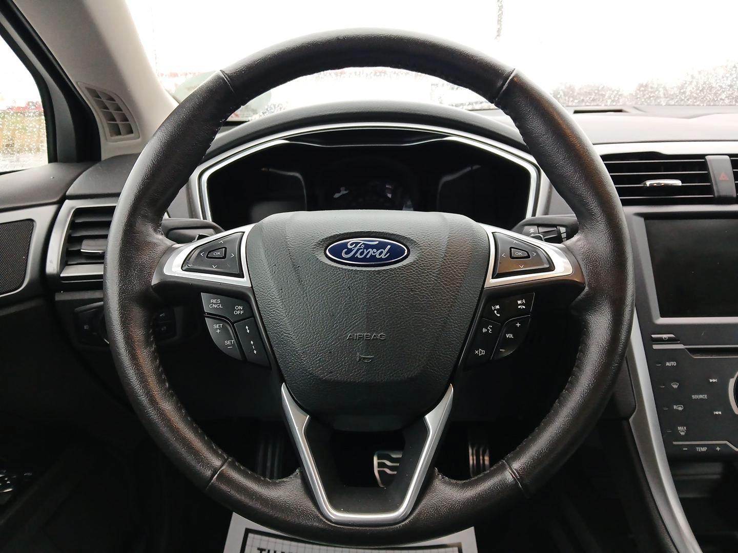 2014 Ford Fusion Titanium AWD (3FA6P0D96ER) with an 2.0L L4 DOHC 16V engine, located at 401 Woodman Dr, Riverside, OH, 45431, (937) 908-9800, 39.760899, -84.123421 - 2014 Ford Fusion Titanium AWD - Photo#15