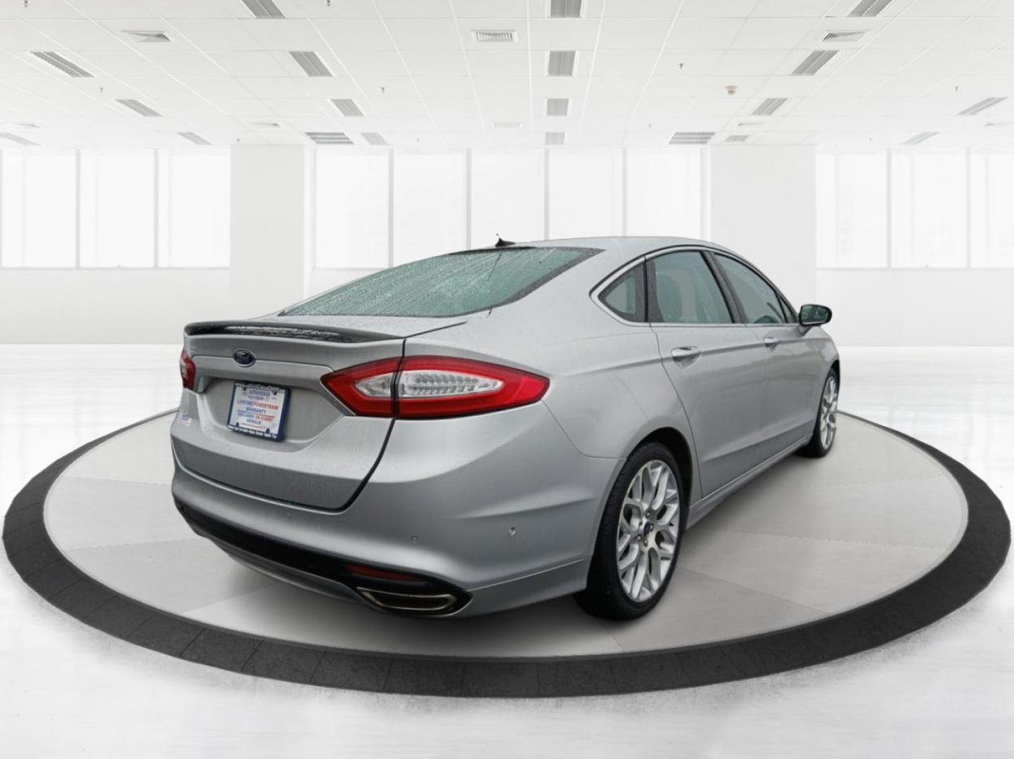 2014 Ford Fusion Titanium AWD (3FA6P0D96ER) with an 2.0L L4 DOHC 16V engine, located at 401 Woodman Dr, Riverside, OH, 45431, (937) 908-9800, 39.760899, -84.123421 - 2014 Ford Fusion Titanium AWD - Photo#2