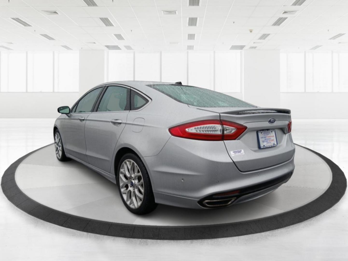 2014 Ford Fusion Titanium AWD (3FA6P0D96ER) with an 2.0L L4 DOHC 16V engine, located at 401 Woodman Dr, Riverside, OH, 45431, (937) 908-9800, 39.760899, -84.123421 - 2014 Ford Fusion Titanium AWD - Photo#4