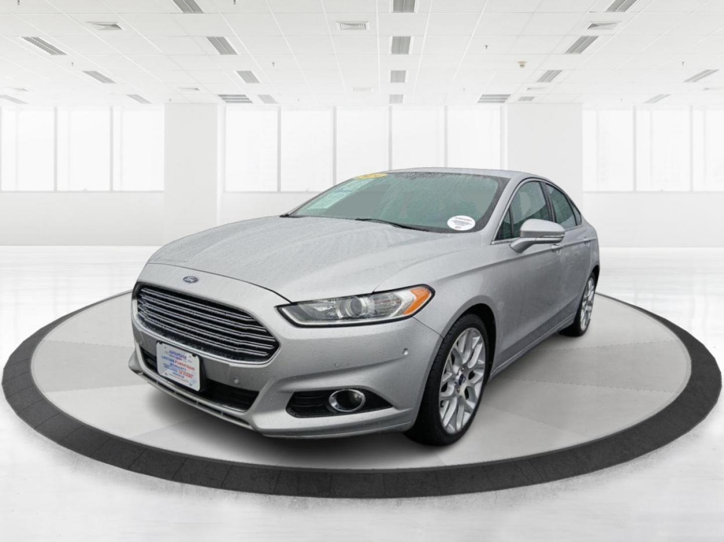 2014 Ford Fusion Titanium AWD (3FA6P0D96ER) with an 2.0L L4 DOHC 16V engine, located at 401 Woodman Dr, Riverside, OH, 45431, (937) 908-9800, 39.760899, -84.123421 - 2014 Ford Fusion Titanium AWD - Photo#7