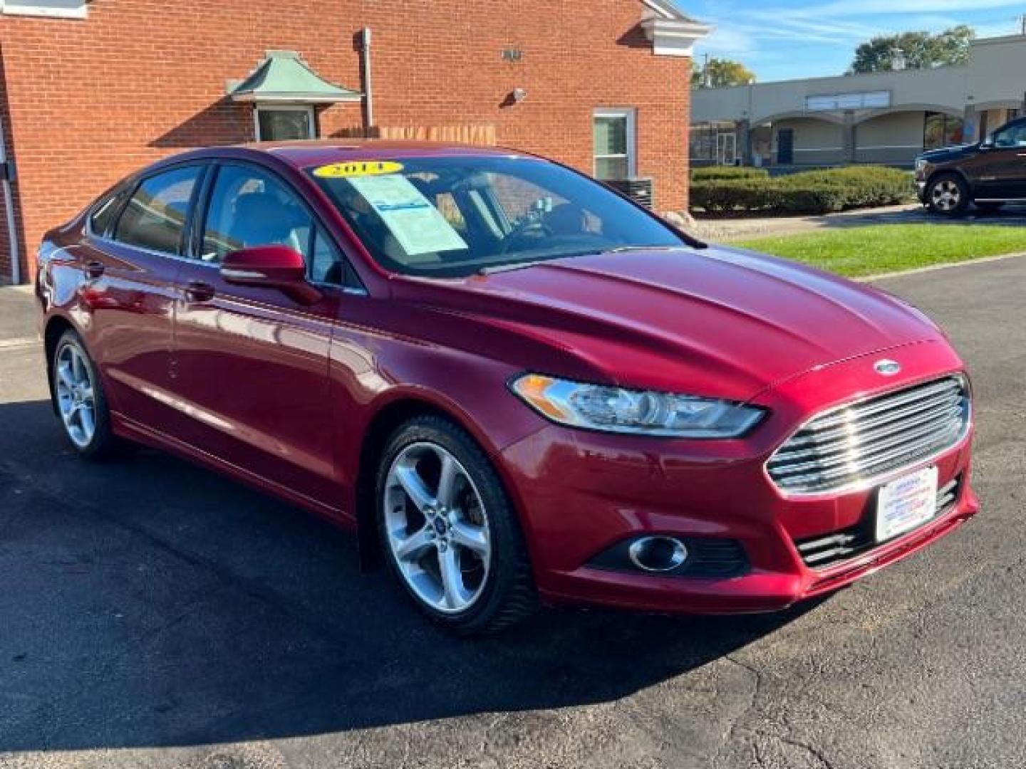 2014 Ruby Red Met Tinted CC Ford Fusion SE (3FA6P0H77ER) with an 2.5L L4 DOHC 16V engine, located at 1951 S Dayton Lakeview Rd., New Carlisle, OH, 45344, (937) 908-9800, 39.890999, -84.050255 - Photo#0