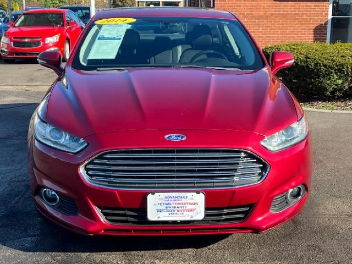 2014 Ruby Red Met Tinted CC Ford Fusion SE (3FA6P0H77ER) with an 2.5L L4 DOHC 16V engine, located at 1951 S Dayton Lakeview Rd., New Carlisle, OH, 45344, (937) 908-9800, 39.890999, -84.050255 - Photo#1